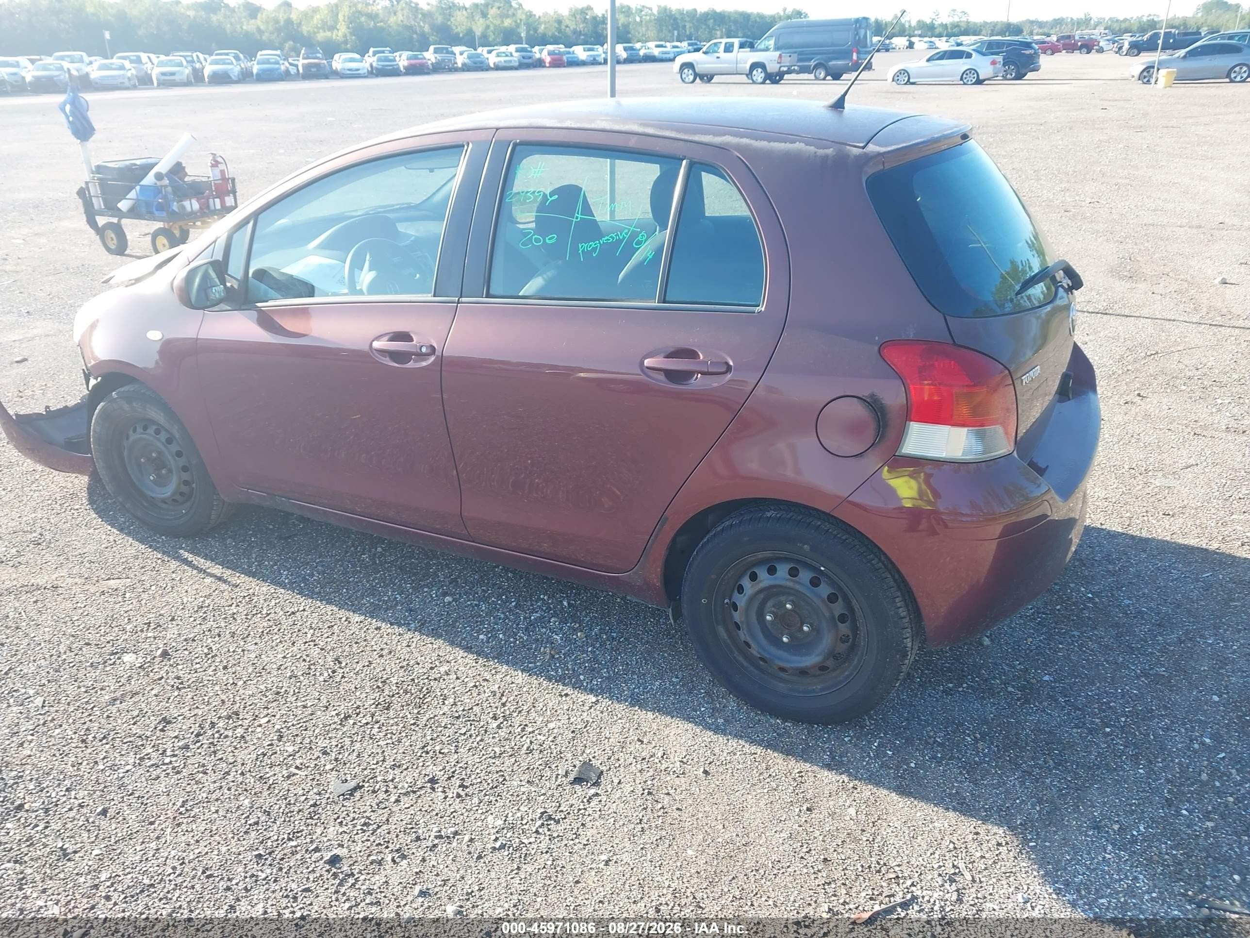 2009 Toyota Yaris   Burgundy vin: JTDKT903X95242602