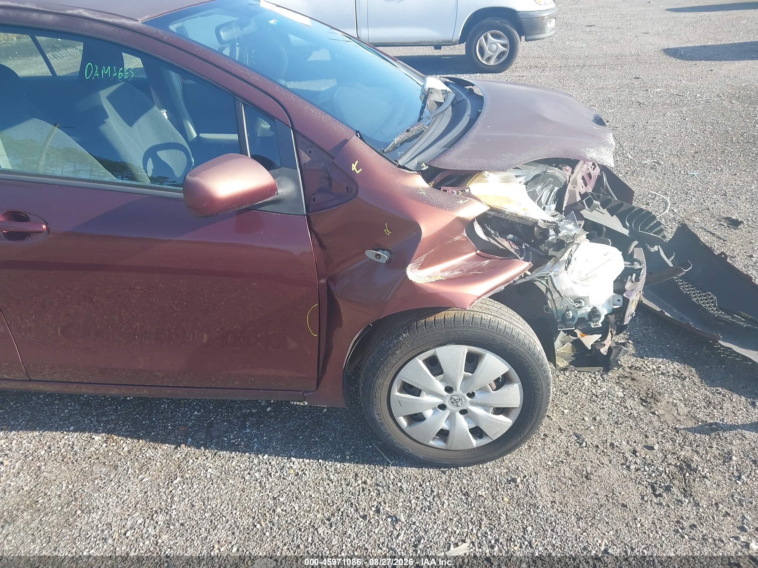 2009 Toyota Yaris   Burgundy vin: JTDKT903X95242602