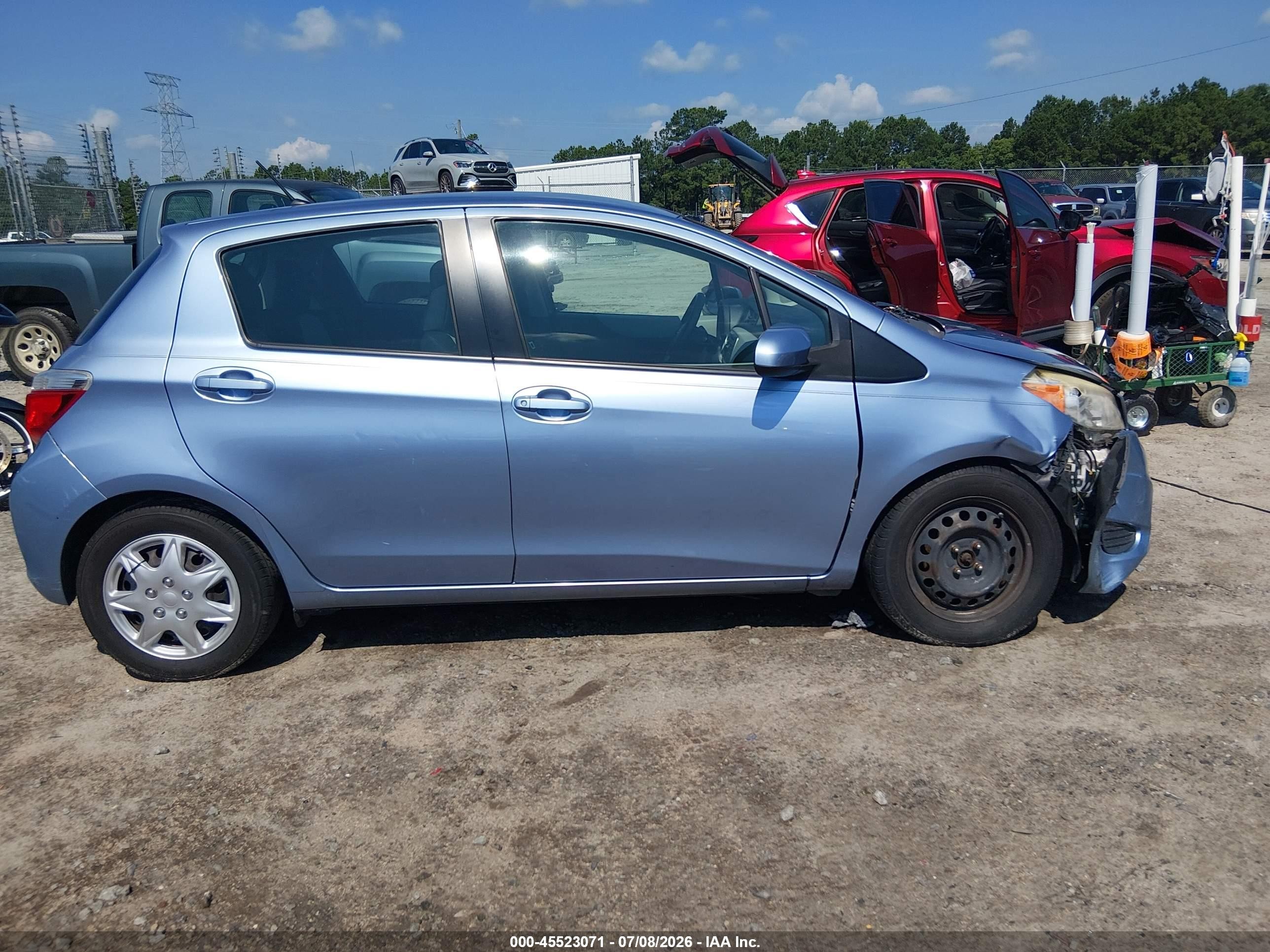 2012 Toyota Yaris Le Light Blue vin: JTDKTUD30CD500846