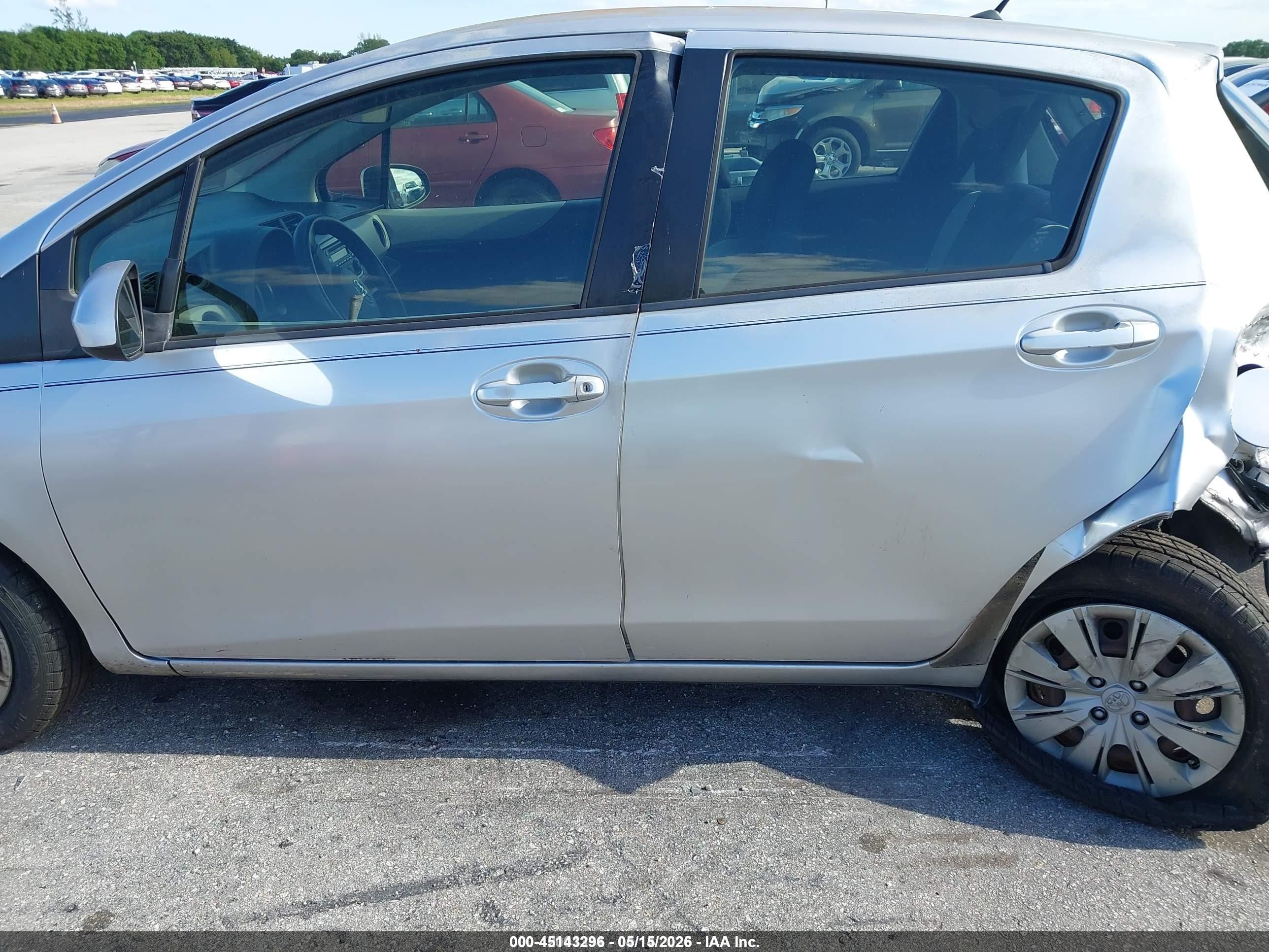 2012 Toyota Yaris L Silver vin: JTDKTUD31CD528249