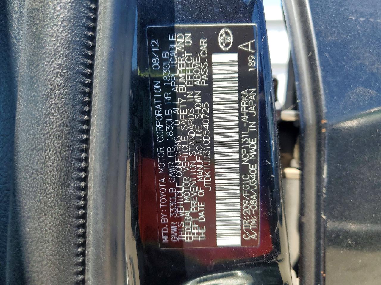 2012 Toyota Yaris 5-door Le Black vin: JTDKTUD31CD540725