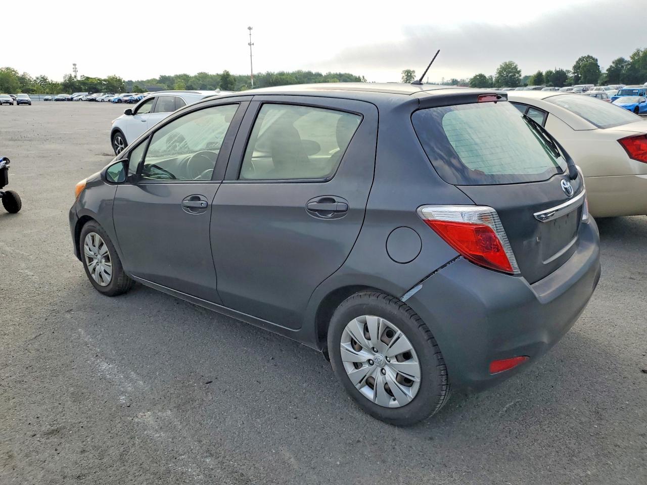 2014 Toyota Yaris 5-door Le Black vin: JTDKTUD31ED575848