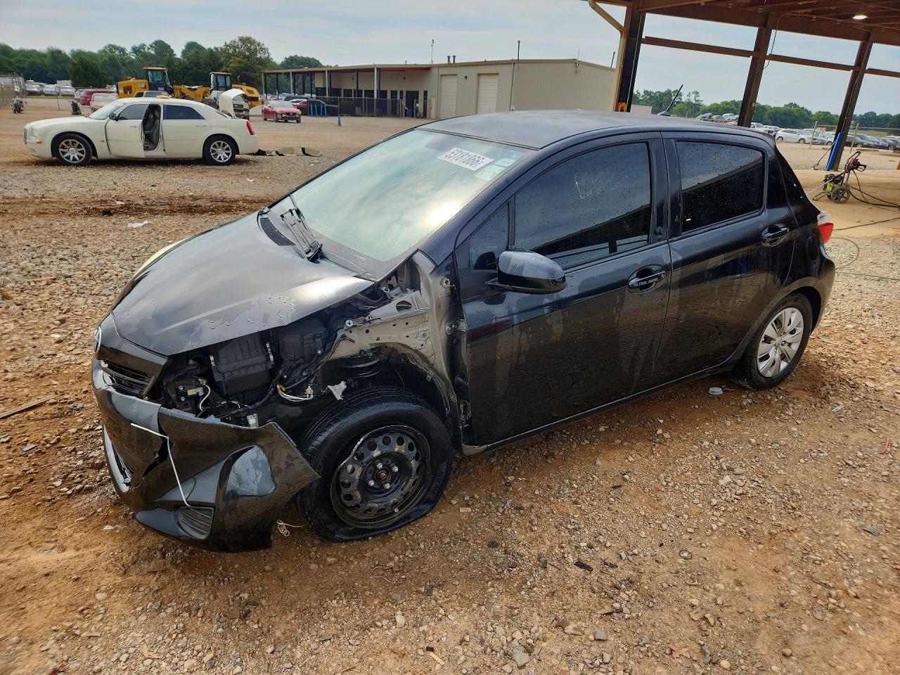 2012 Toyota Yaris 5-door Le Black vin: JTDKTUD32CD514070