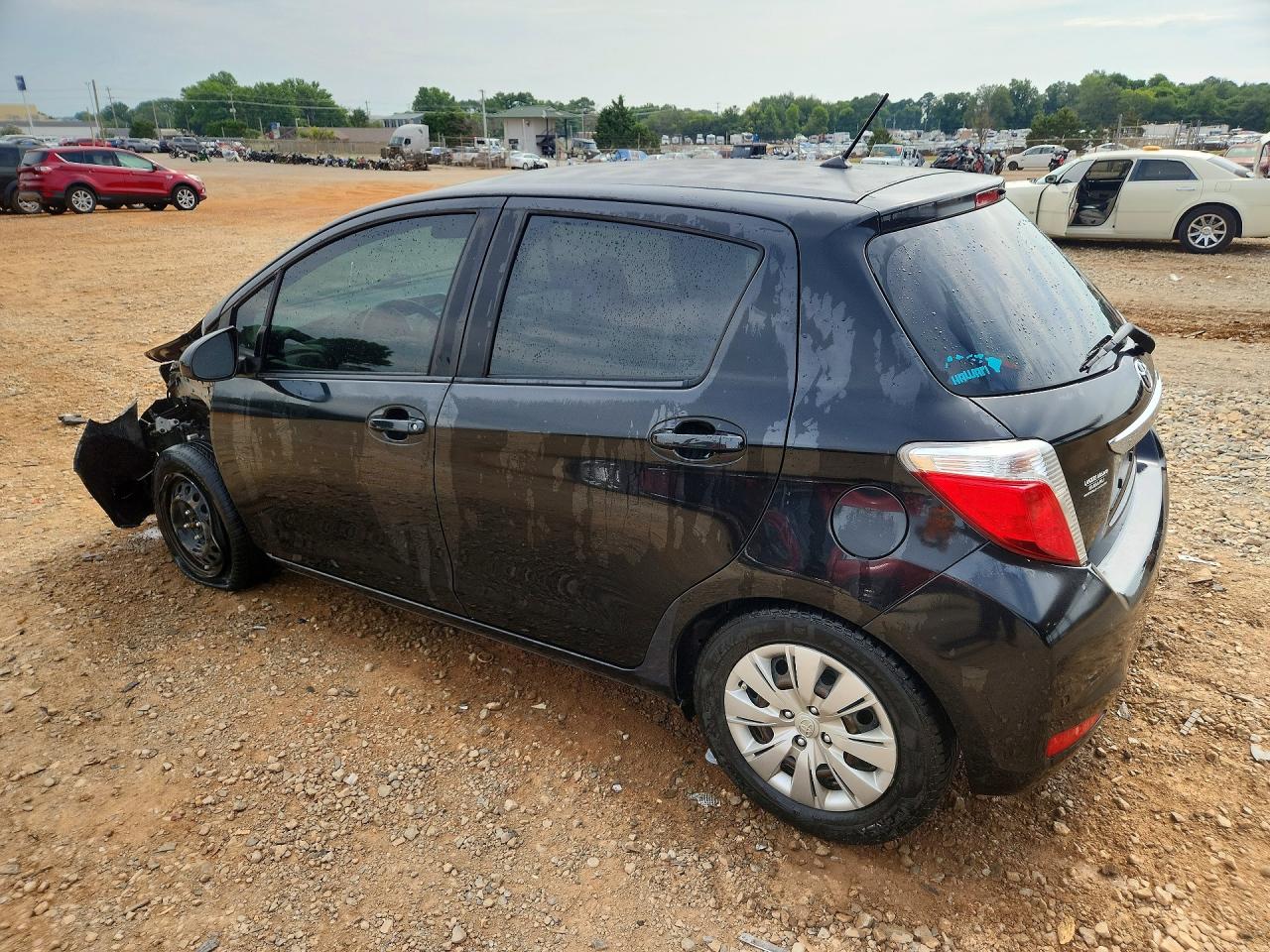 2012 Toyota Yaris 5-door Le Black vin: JTDKTUD32CD514070
