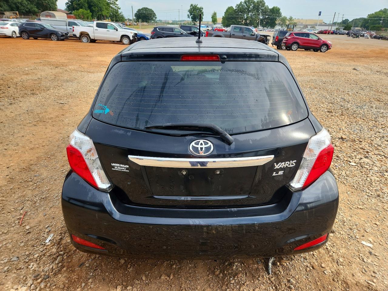 2012 Toyota Yaris 5-door Le Black vin: JTDKTUD32CD514070