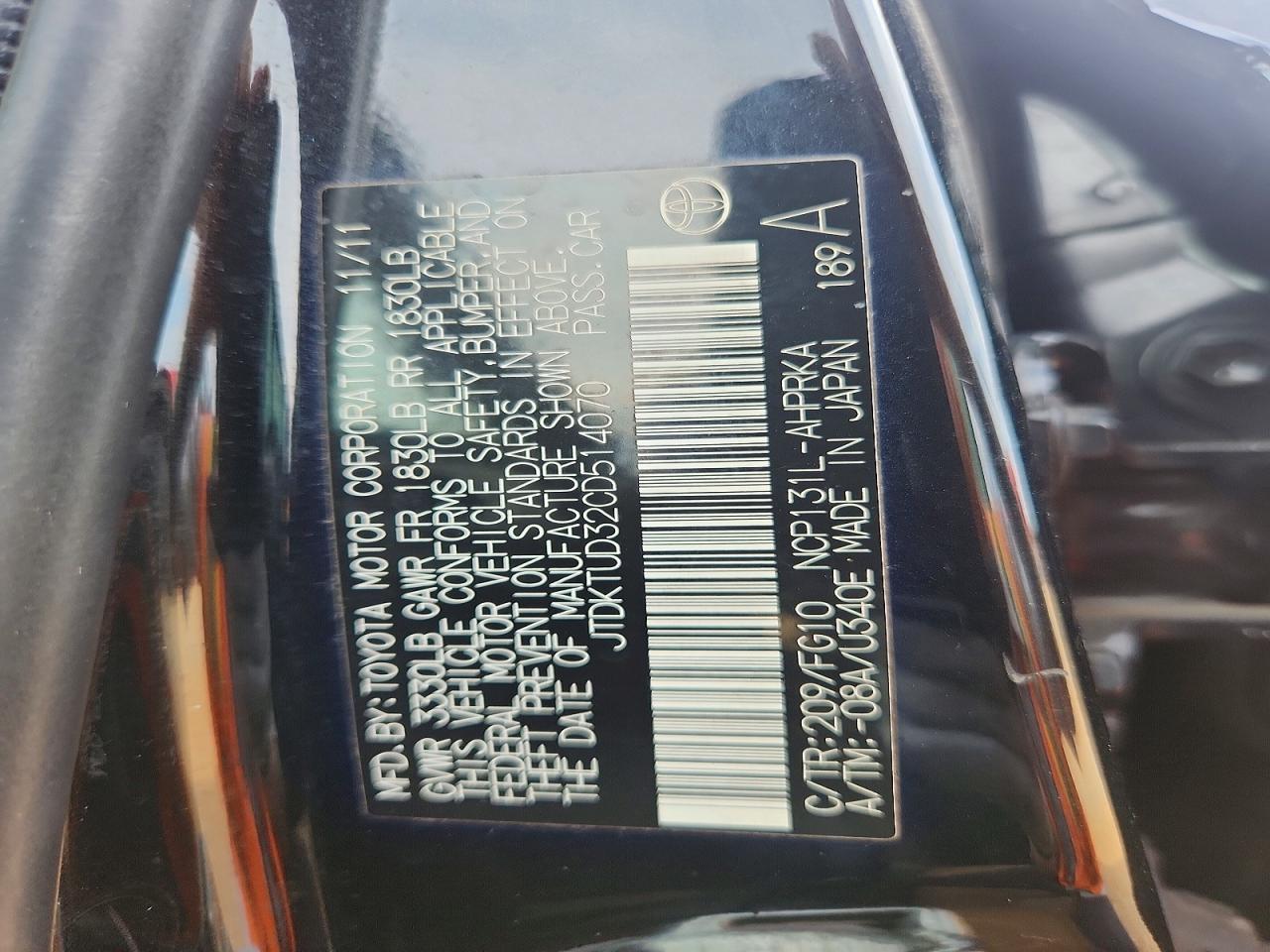 2012 Toyota Yaris 5-door Le Black vin: JTDKTUD32CD514070
