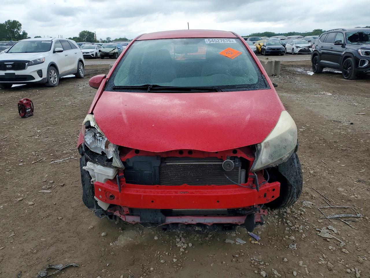 2012 Toyota Yaris 5-door L Red vin: JTDKTUD32CD530365