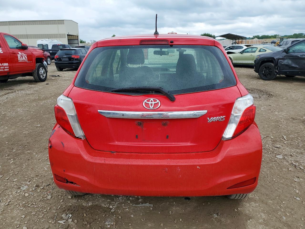 2012 Toyota Yaris 5-door L Red vin: JTDKTUD32CD530365