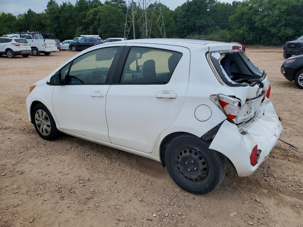 2013 Toyota Yaris 5-door Le White vin: JTDKTUD32DD558135