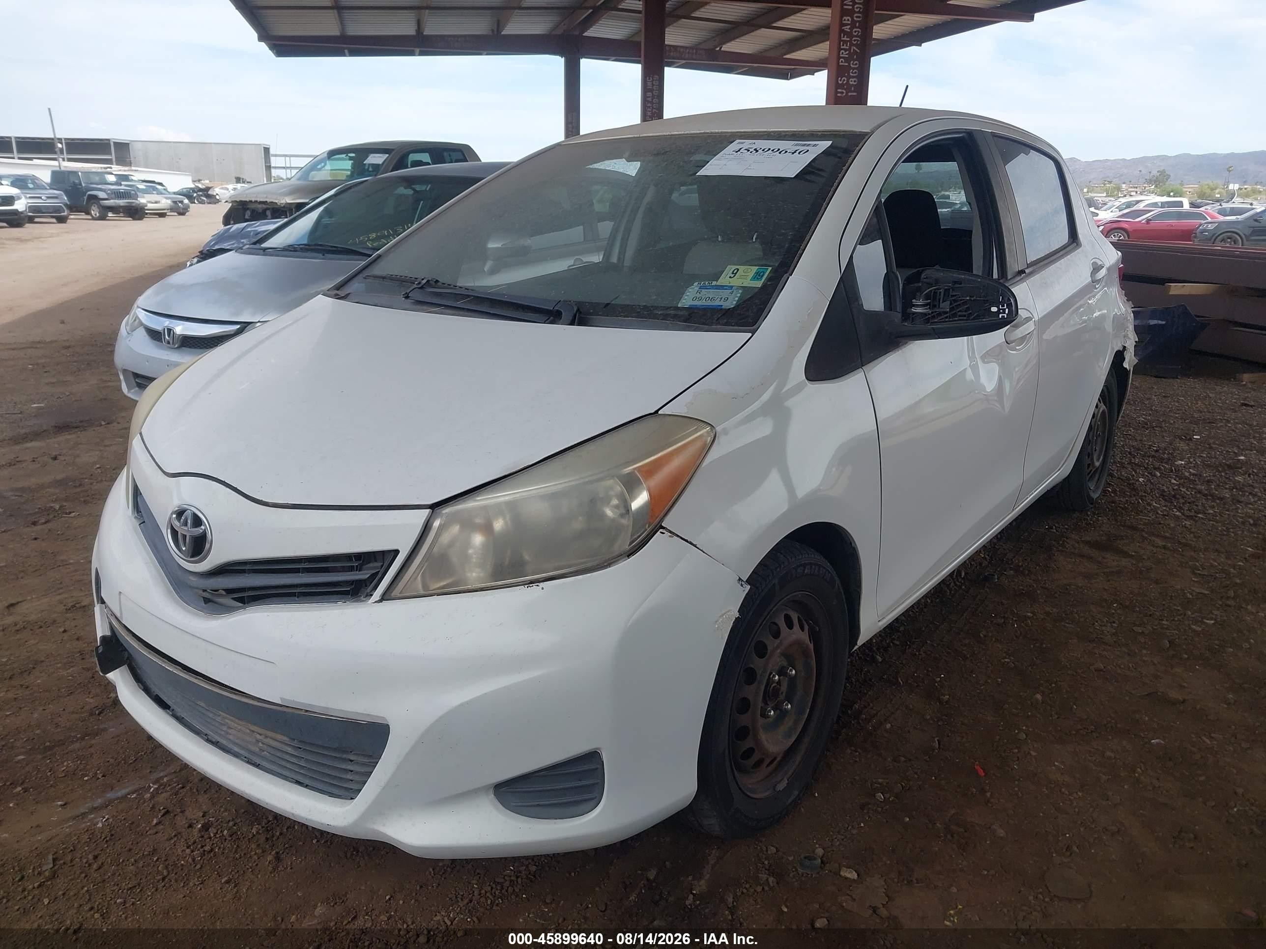 2012 Toyota Yaris Le White vin: JTDKTUD35CD536810