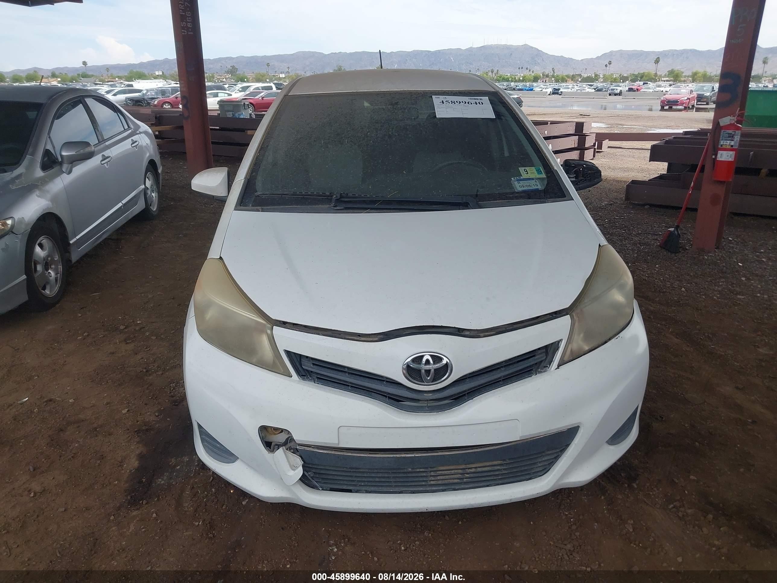 2012 Toyota Yaris Le White vin: JTDKTUD35CD536810