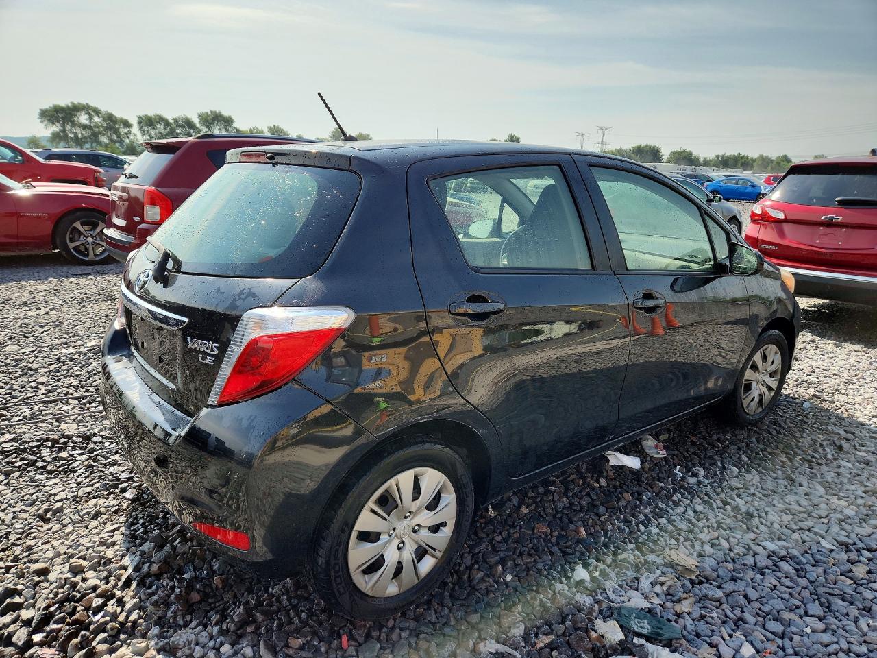 2014 Toyota Yaris 5-door Le Black vin: JTDKTUD35ED574153