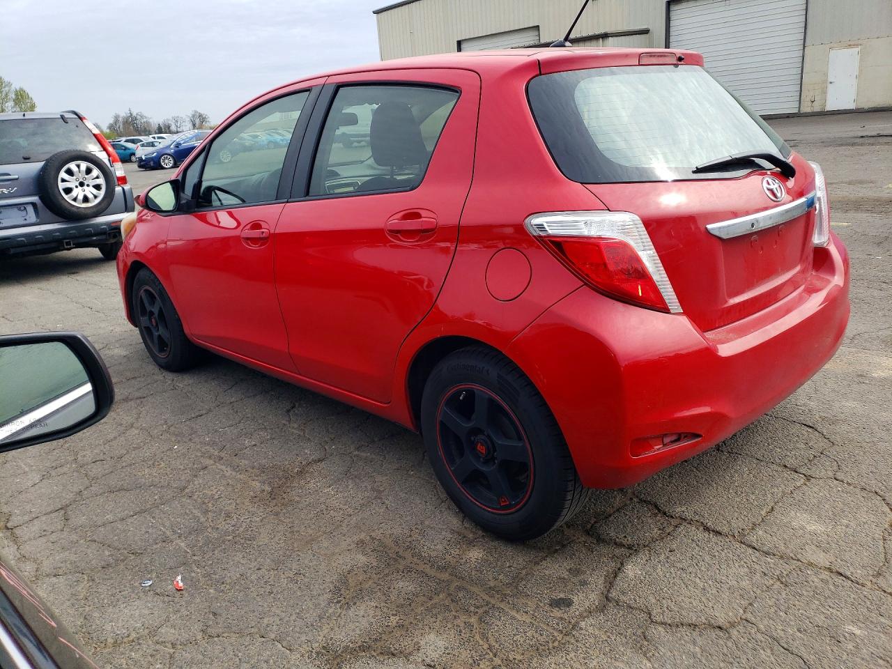 2012 Toyota Yaris 5-door L Red vin: JTDKTUD36CD526819
