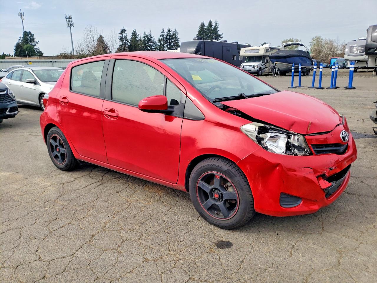 2012 Toyota Yaris 5-door L Red vin: JTDKTUD36CD526819