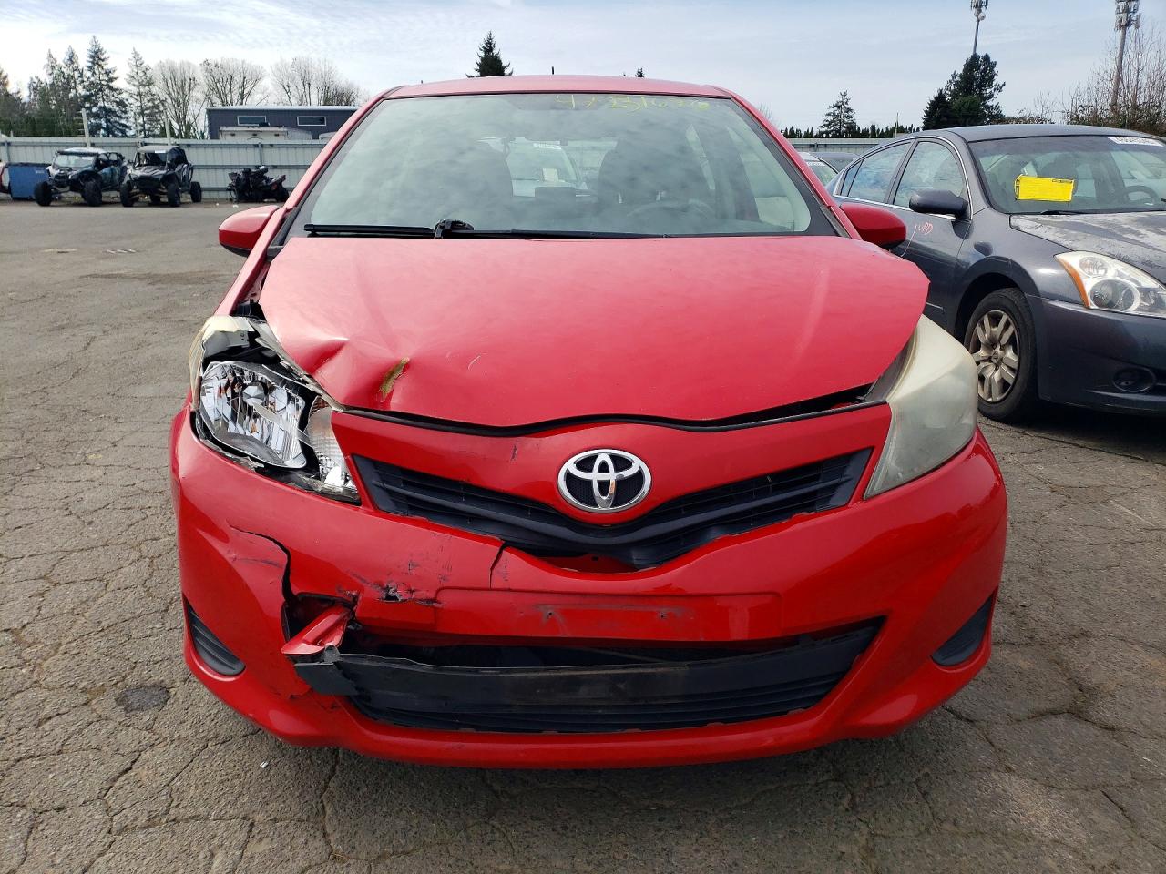 2012 Toyota Yaris 5-door L Red vin: JTDKTUD36CD526819