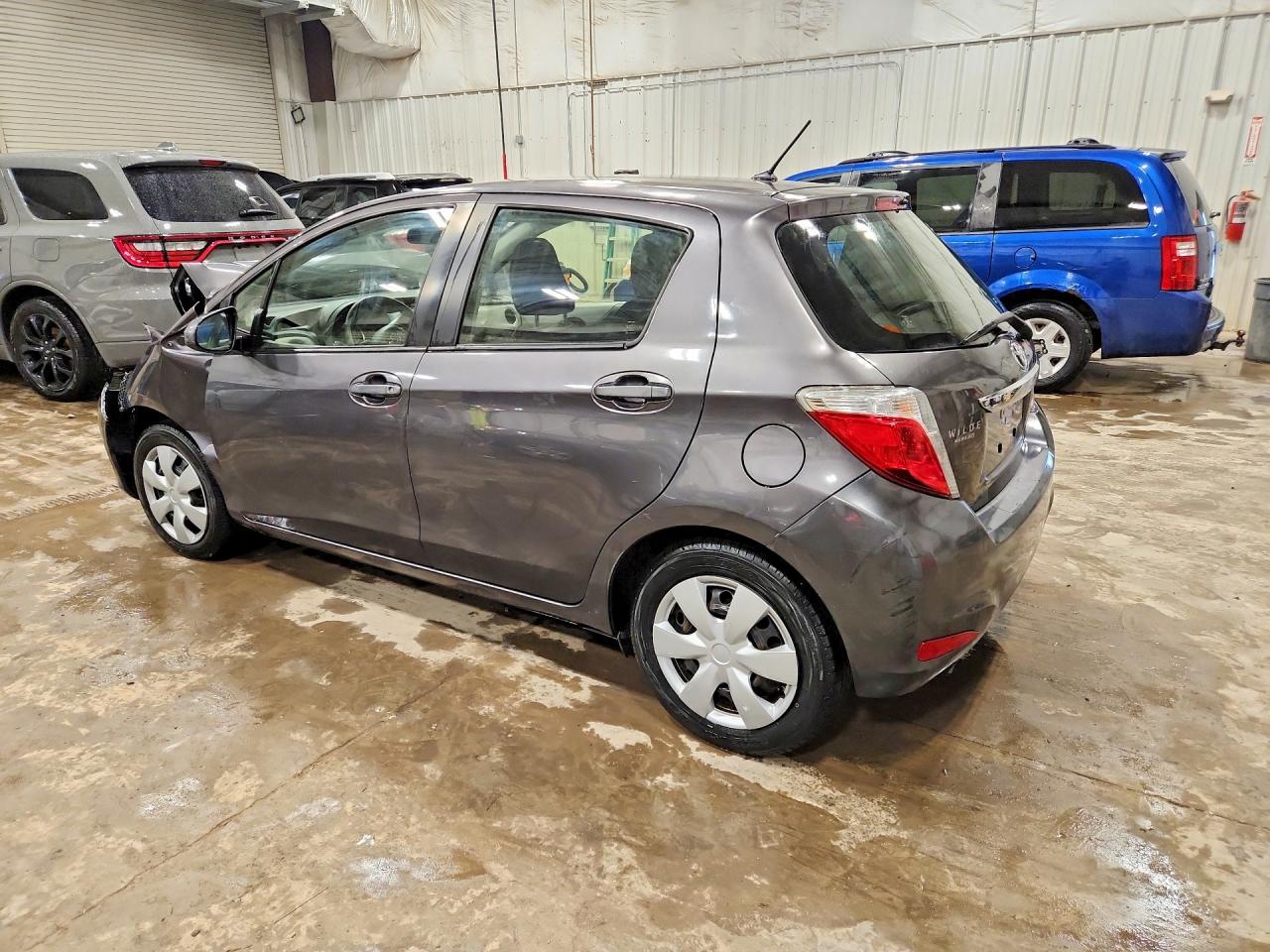 2012 Toyota Yaris 5-door Le Gray vin: JTDKTUD36CD531146