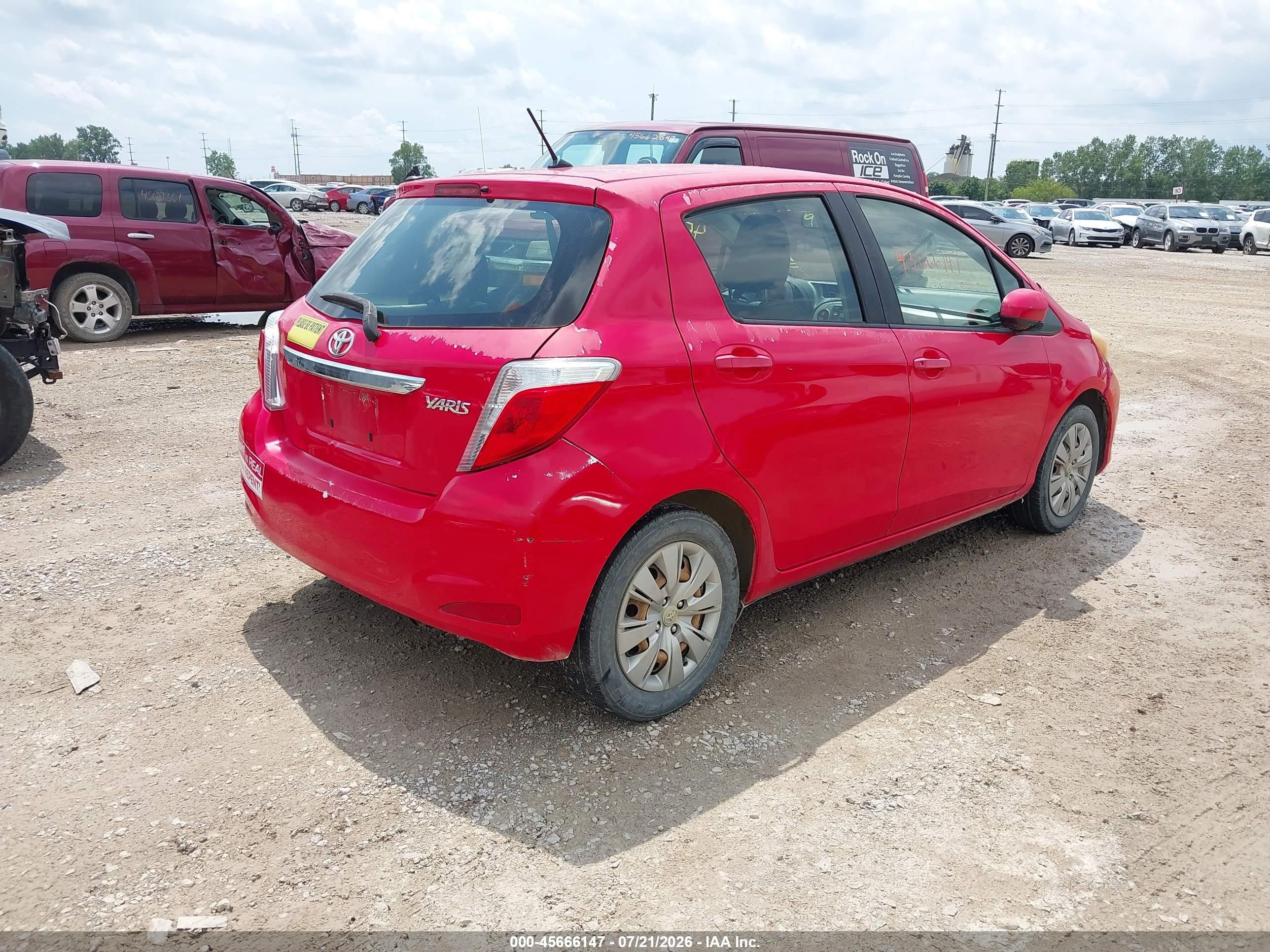 2012 Toyota Yaris L Red vin: JTDKTUD37CD523072