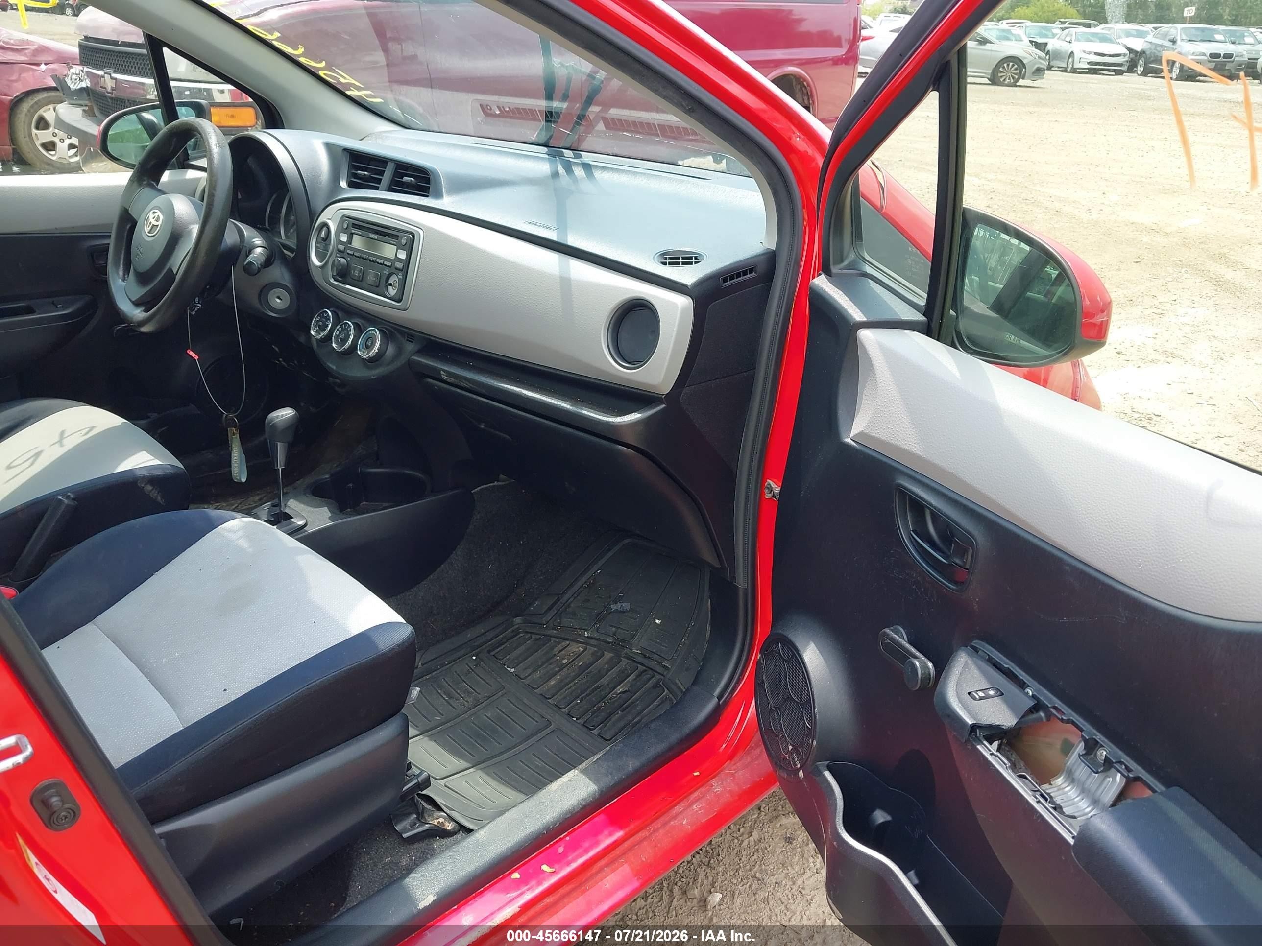 2012 Toyota Yaris L Red vin: JTDKTUD37CD523072
