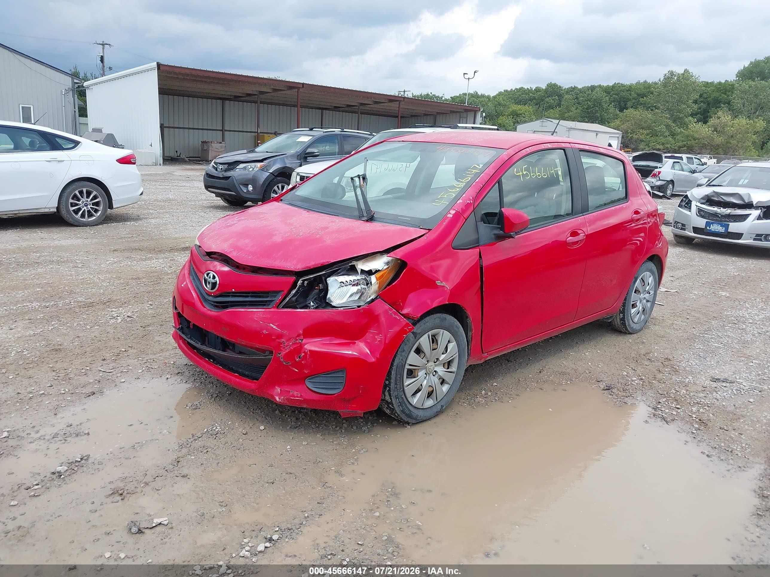 2012 Toyota Yaris L Red vin: JTDKTUD37CD523072