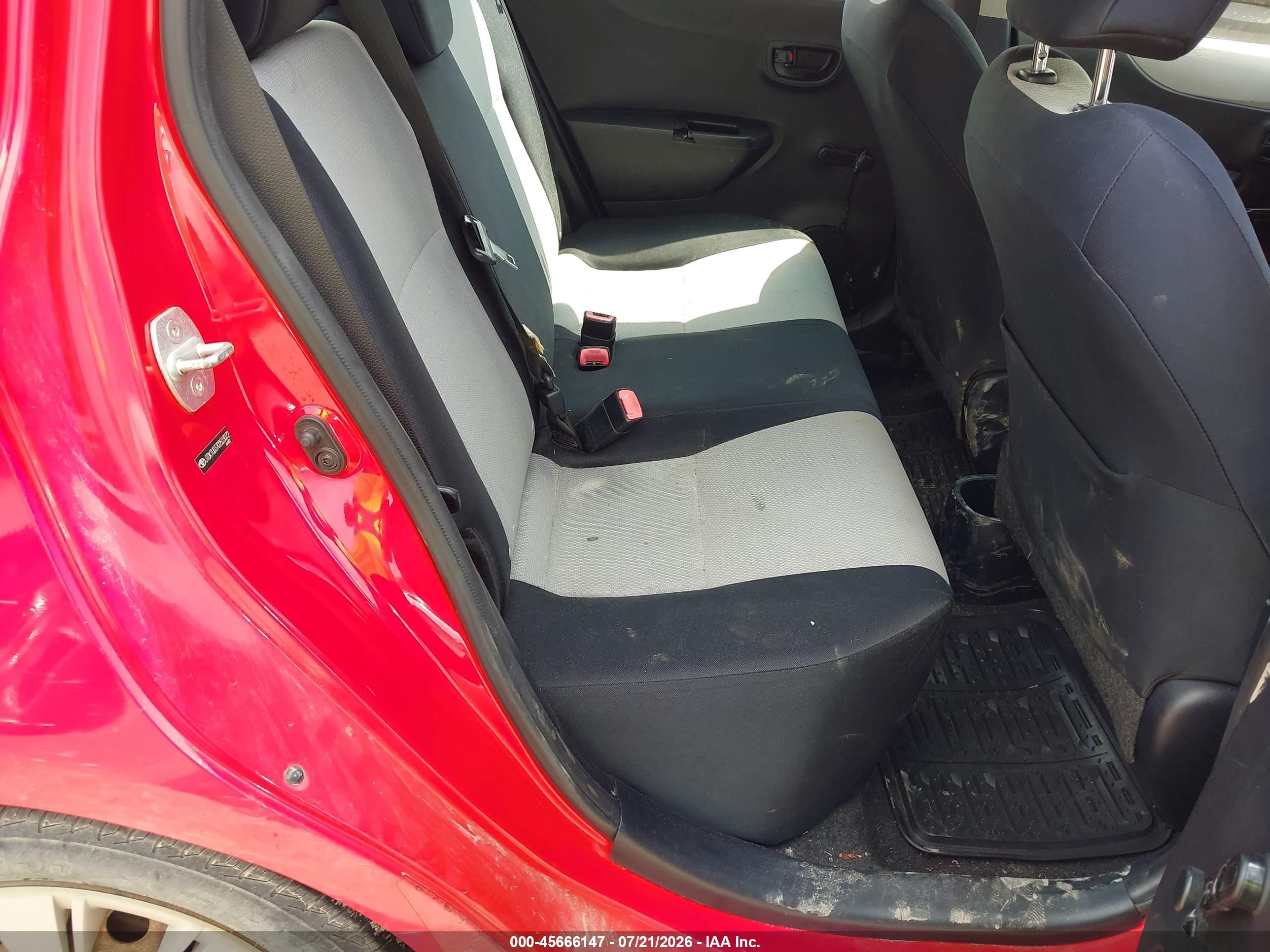 2012 Toyota Yaris L Red vin: JTDKTUD37CD523072