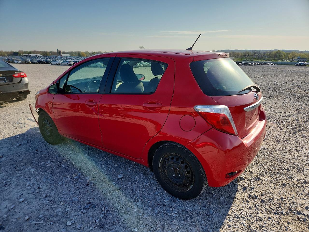 2012 Toyota Yaris 5-door L Red vin: JTDKTUD37CD530944