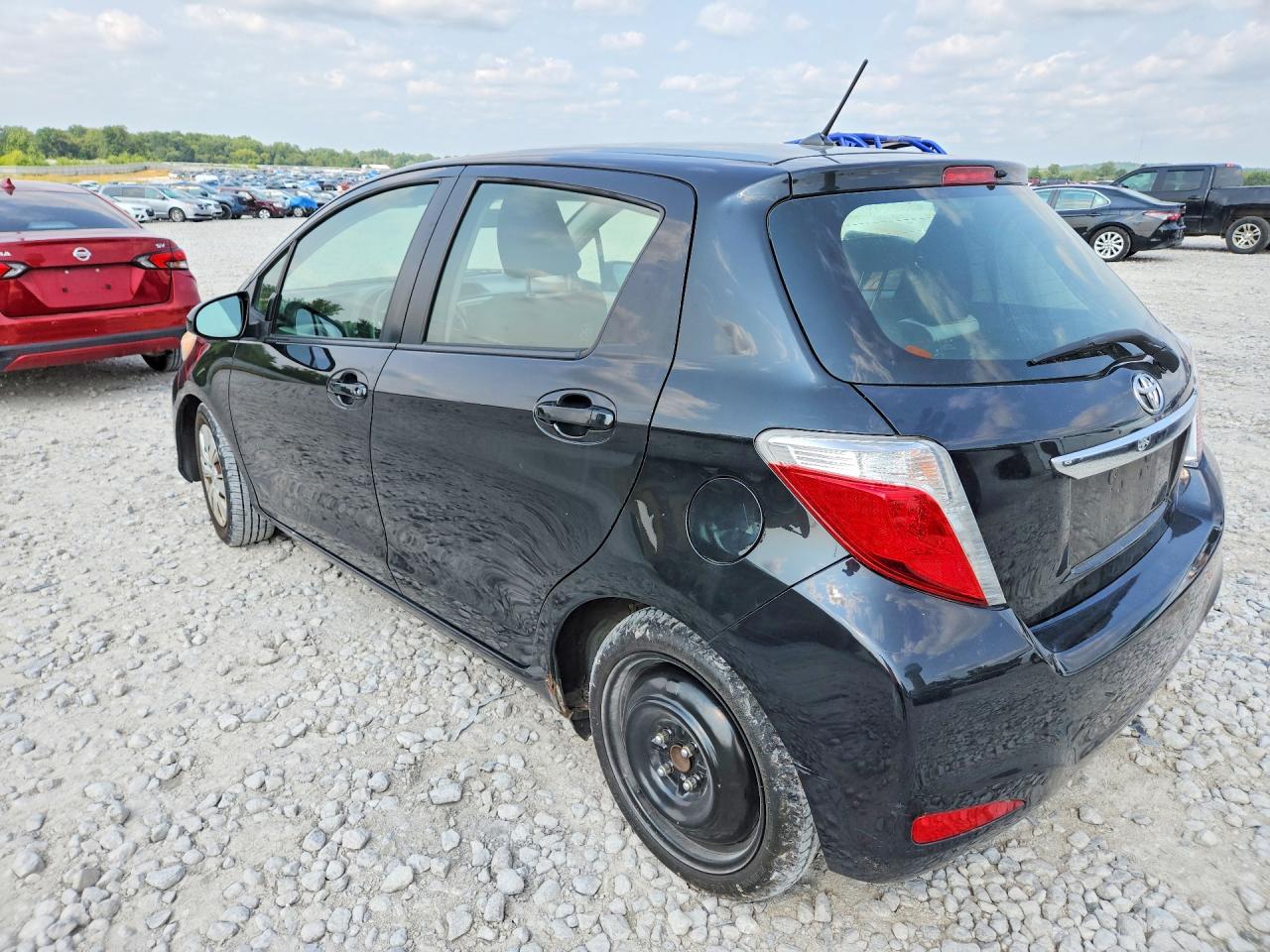 2012 Toyota Yaris 5-door Le Black vin: JTDKTUD38CD508936