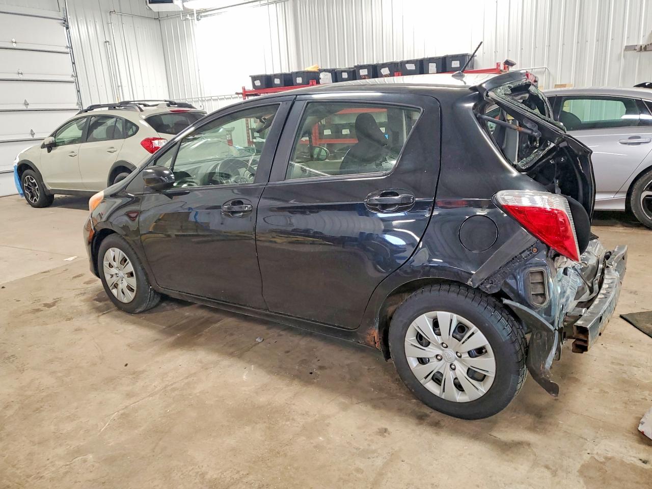 2013 Toyota Yaris 5-door Le Black vin: JTDKTUD38DD554283