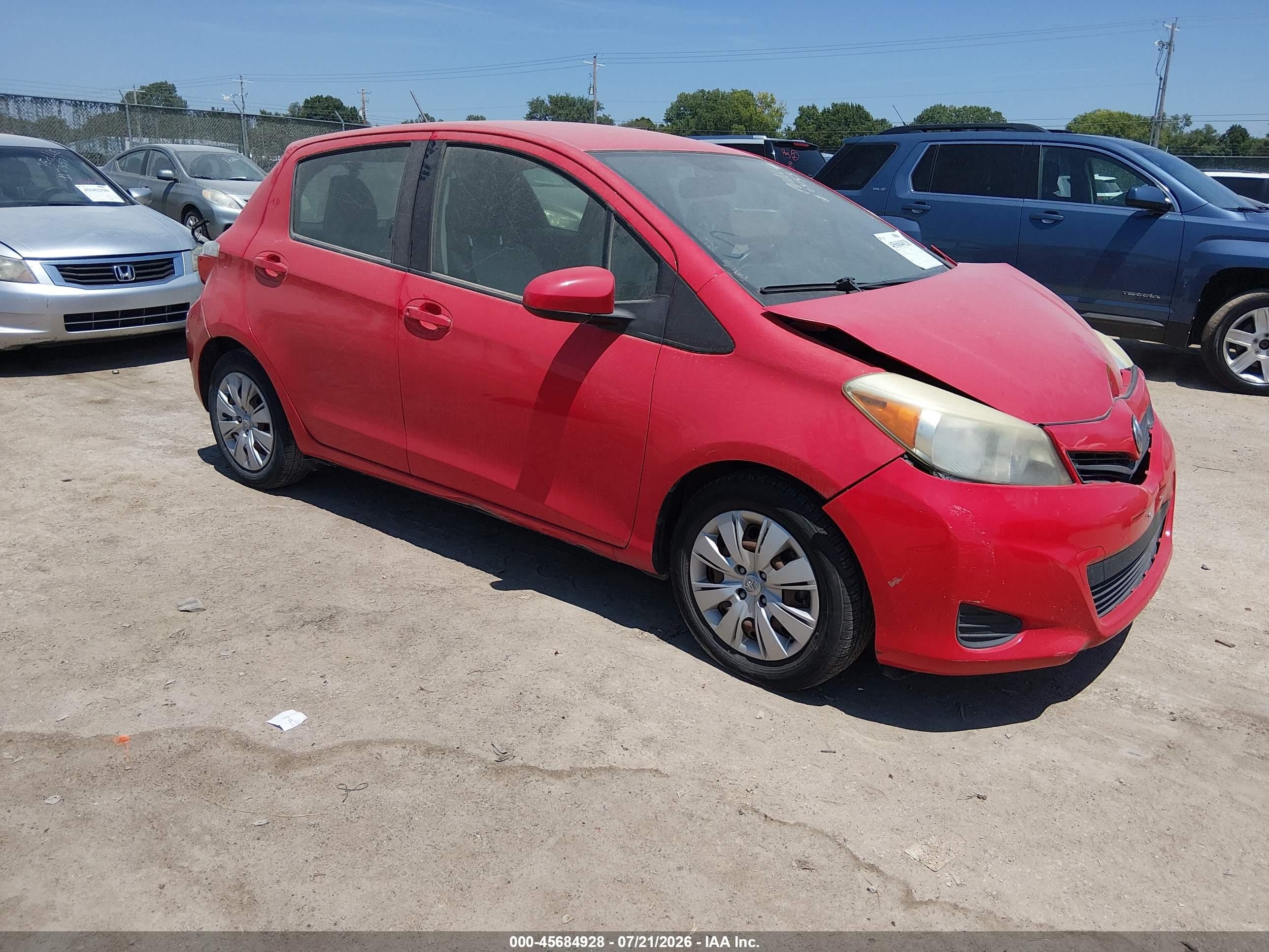 2012 Toyota Yaris L Red vin: JTDKTUD39CD504040
