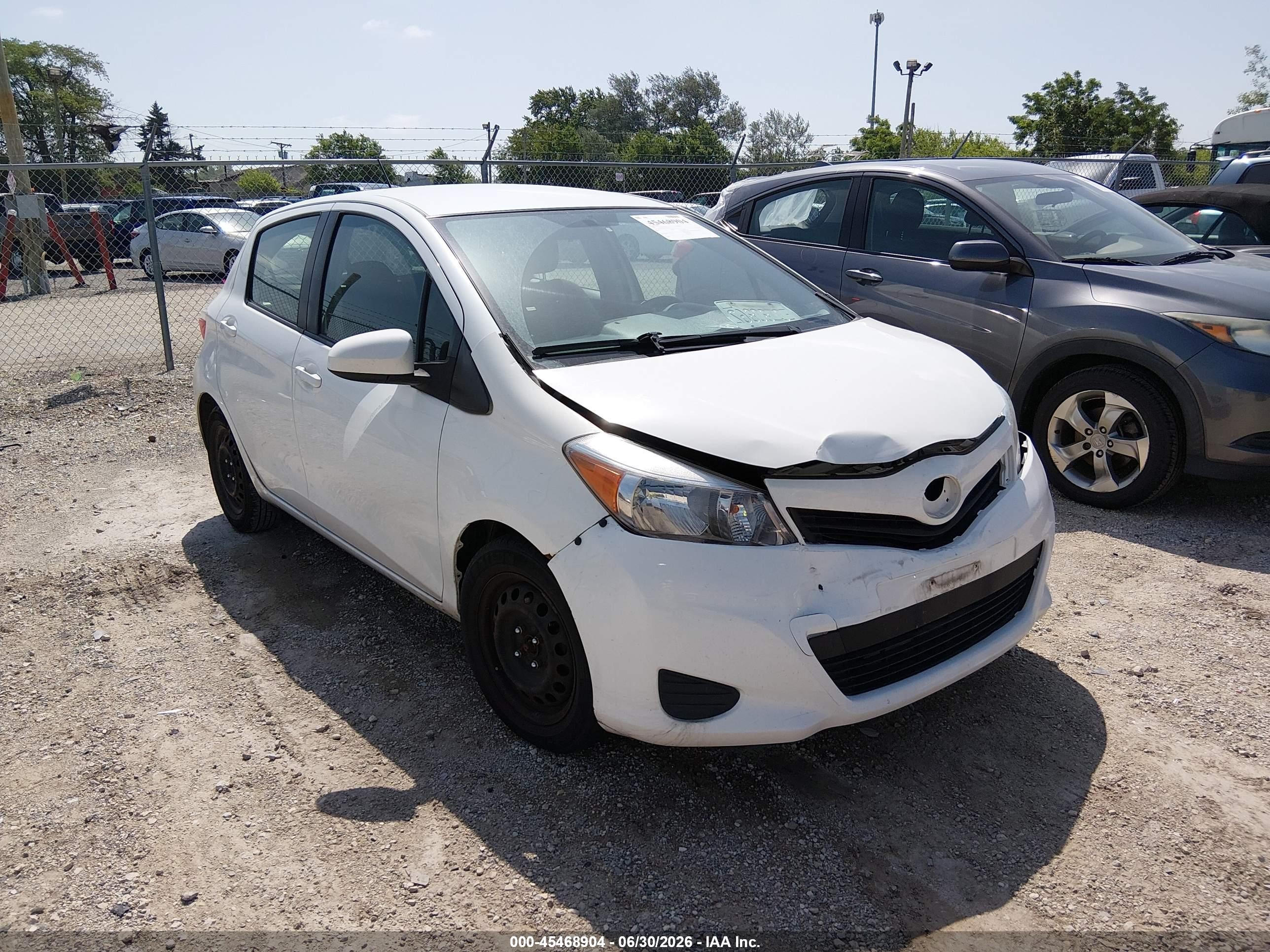 2012 Toyota Yaris Le White vin: JTDKTUD39CD514650