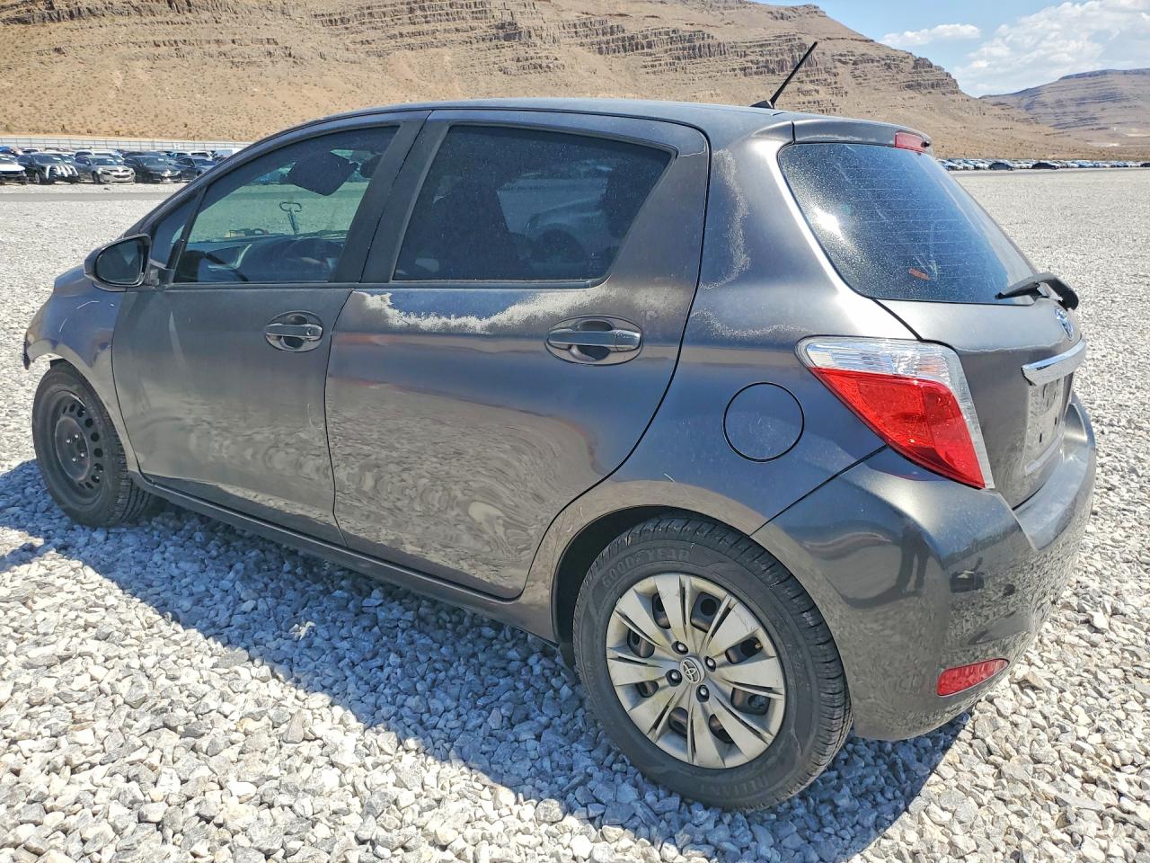 2012 Toyota Yaris 5-door Le Gray vin: JTDKTUD39CD518794