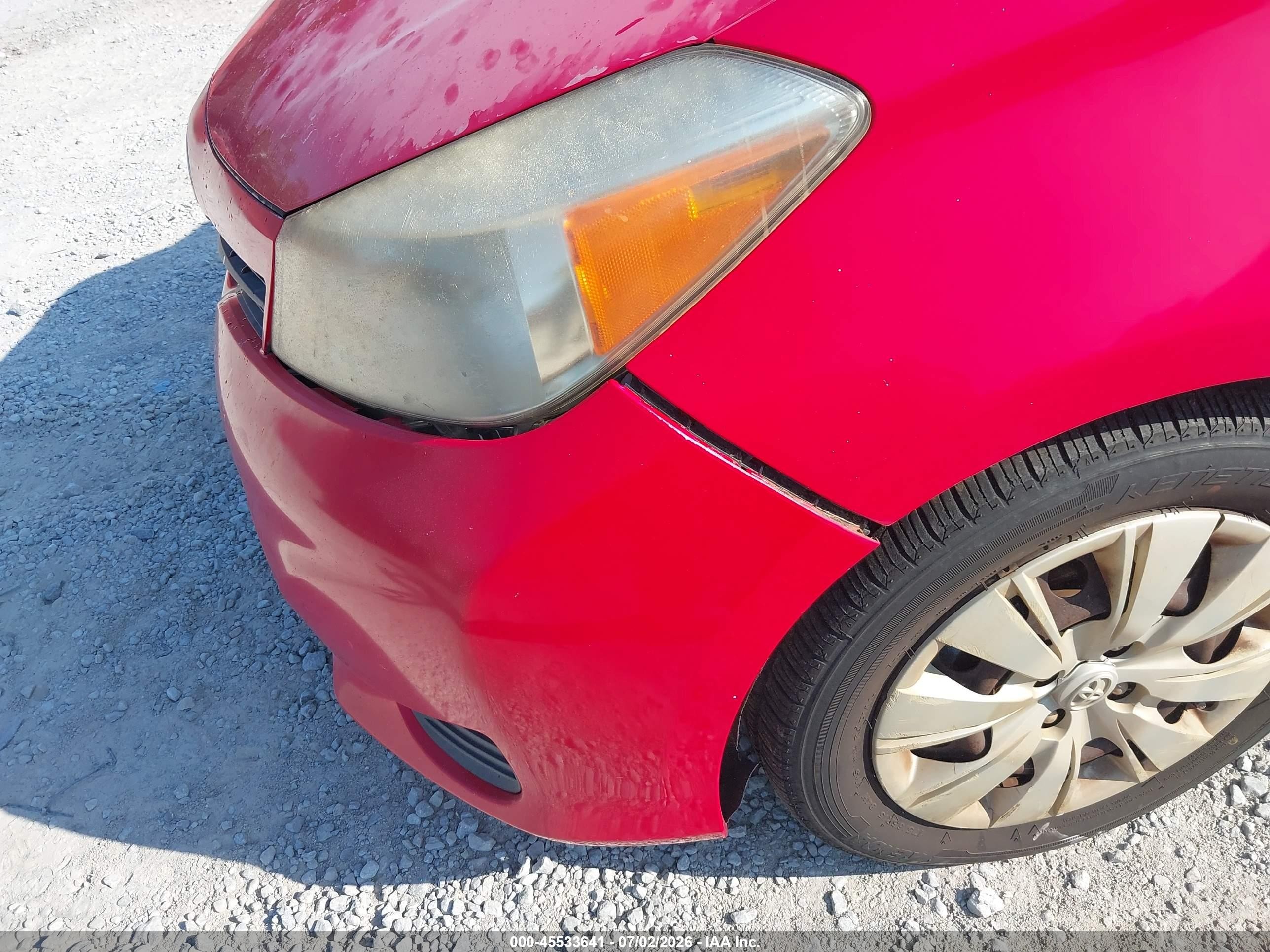 2012 Toyota Yaris Le Red vin: JTDKTUD39CD529486