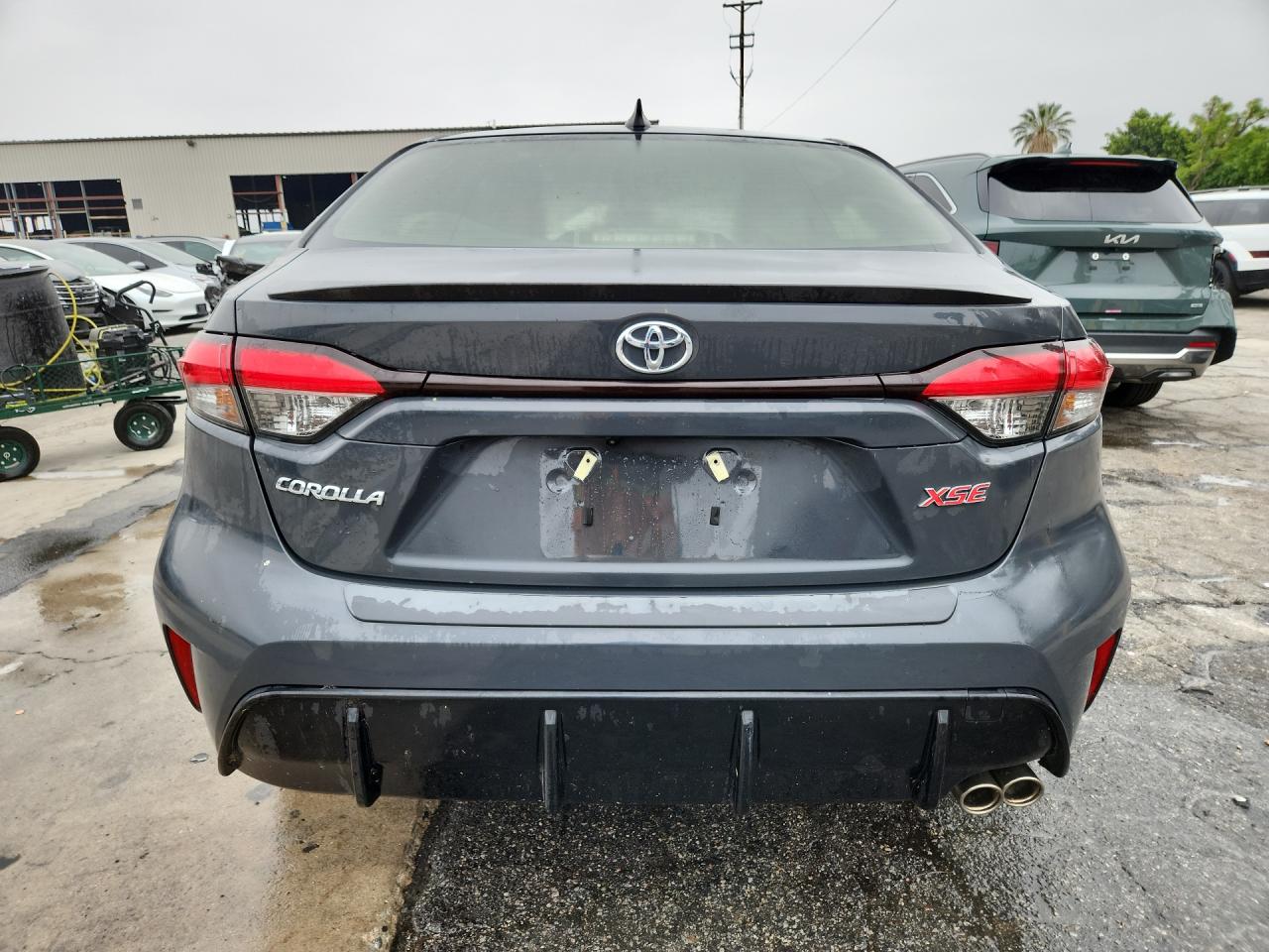 2023 Toyota Corolla Xse Gray vin: JTDT4MCEXP3518383 Damage: Rear Bumper Center Molding, Dent(S) W/ Paint Dmg, Replacement Required