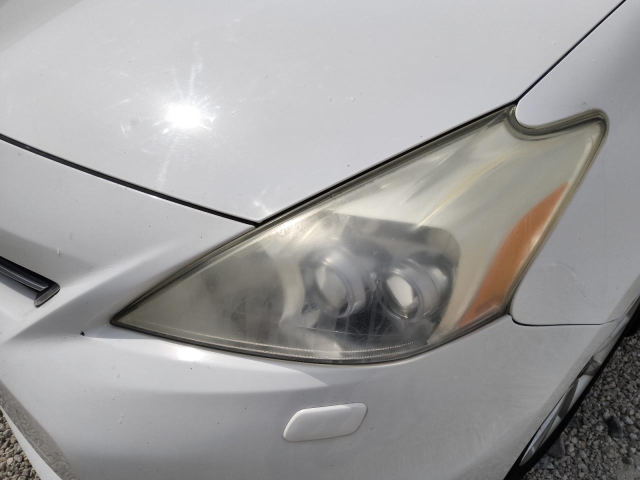 2012 Toyota Prius V Five White vin: JTDZN3EU1C3041472 Damage: Left Head Lamp, Faded, Repair Required