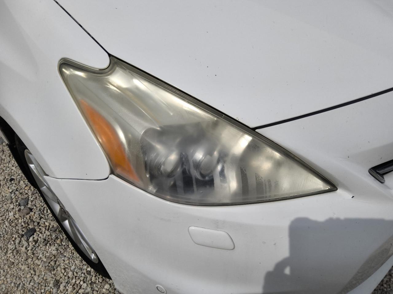 2012 Toyota Prius V Five White vin: JTDZN3EU1C3041472 Damage: Right Head Lamp, Faded, Repair Required
