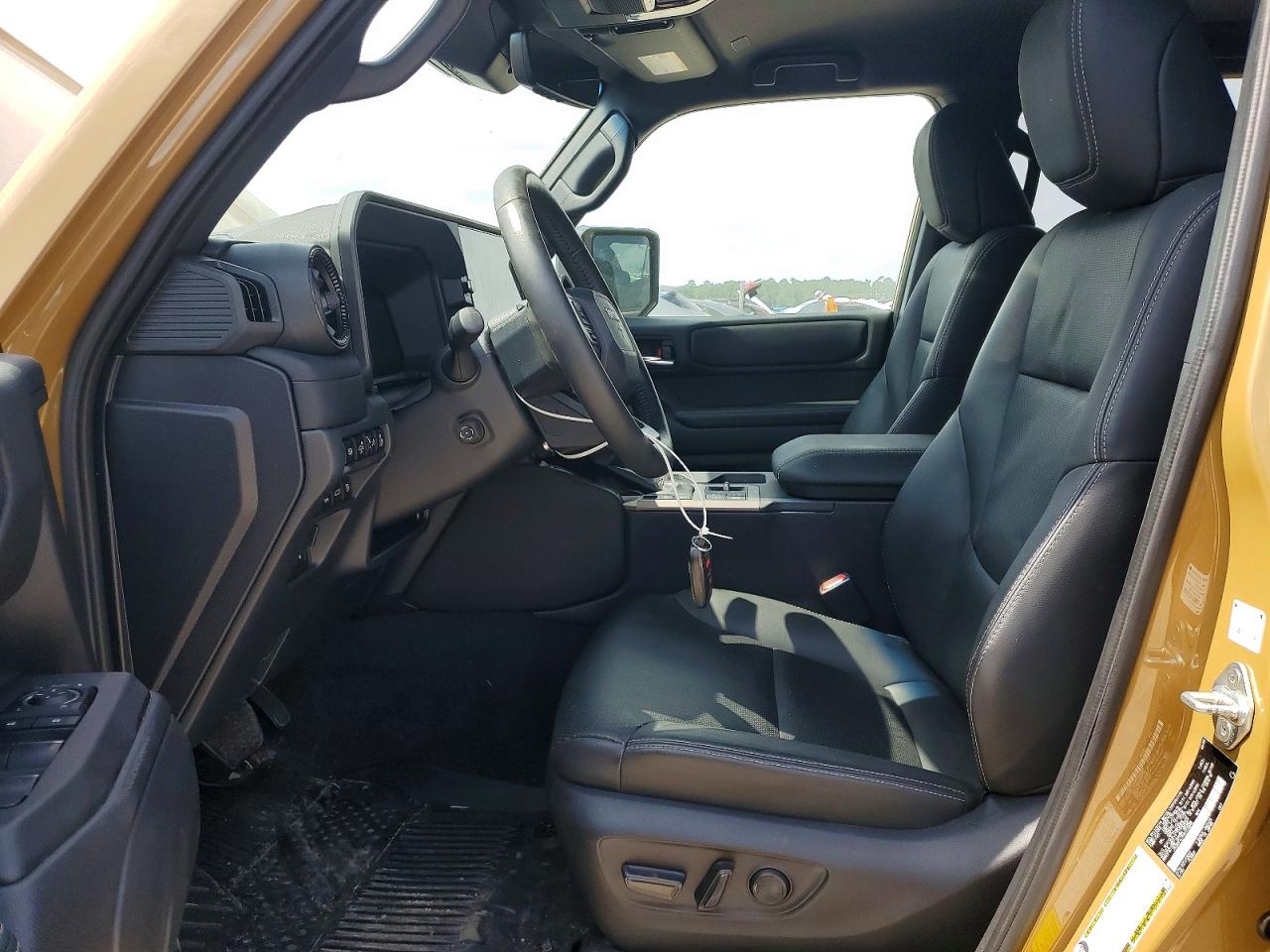 2024 Toyota Land Cruiser Base Tan vin: JTEABFAJ1RK010848