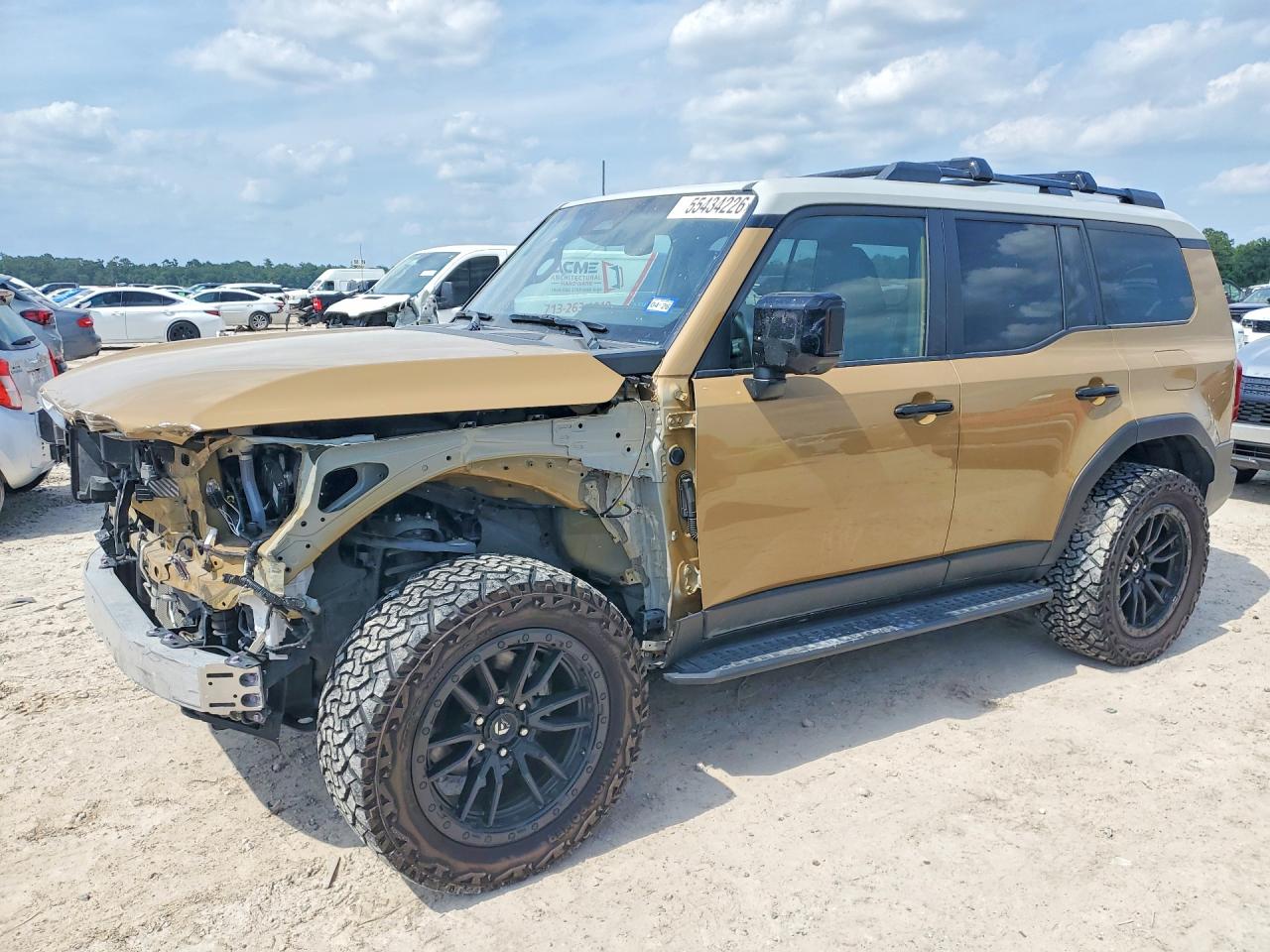 2024 Toyota Land Cruiser Base Tan vin: JTEABFAJ1RK010848
