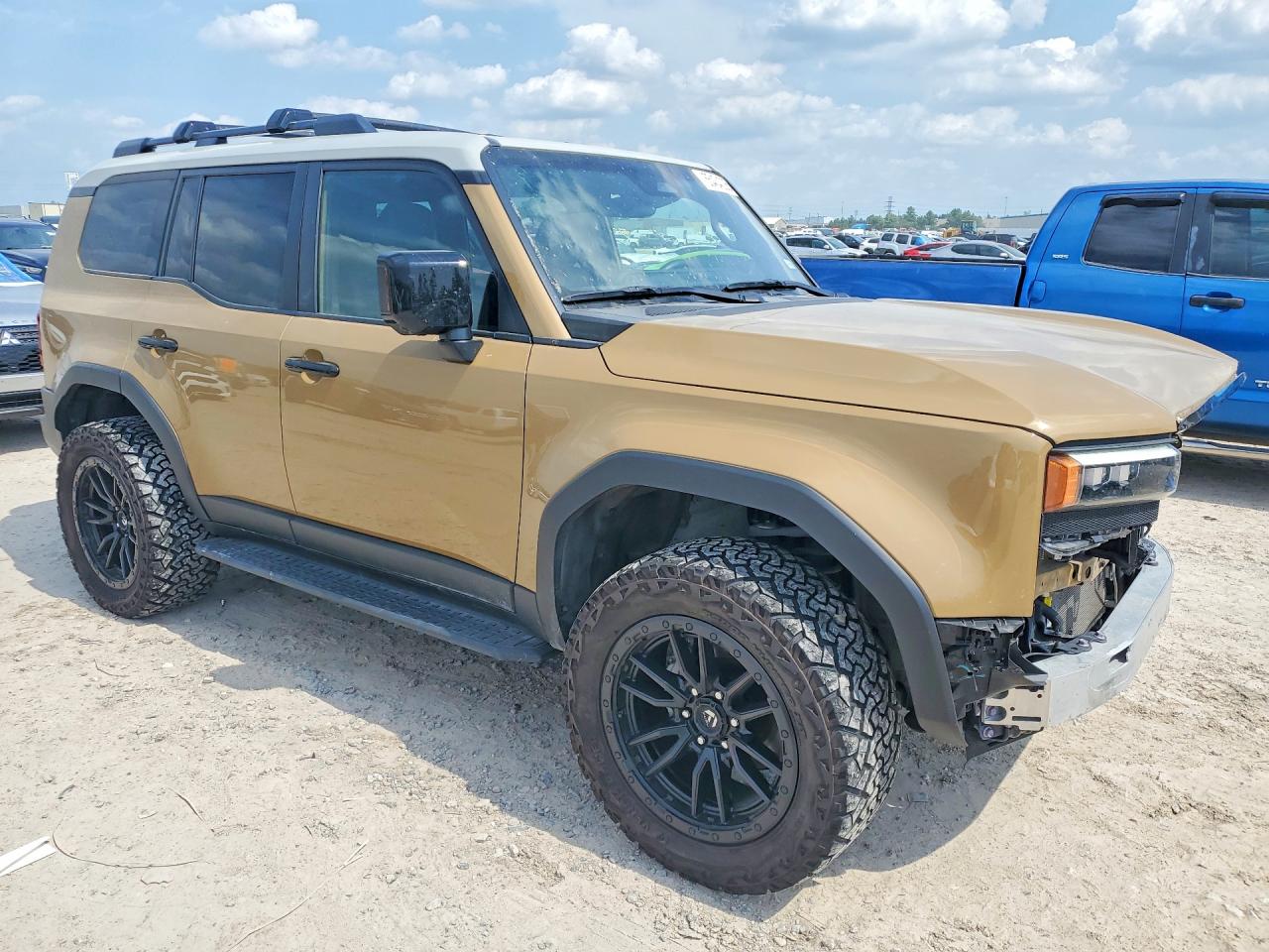2024 Toyota Land Cruiser Base Tan vin: JTEABFAJ1RK010848