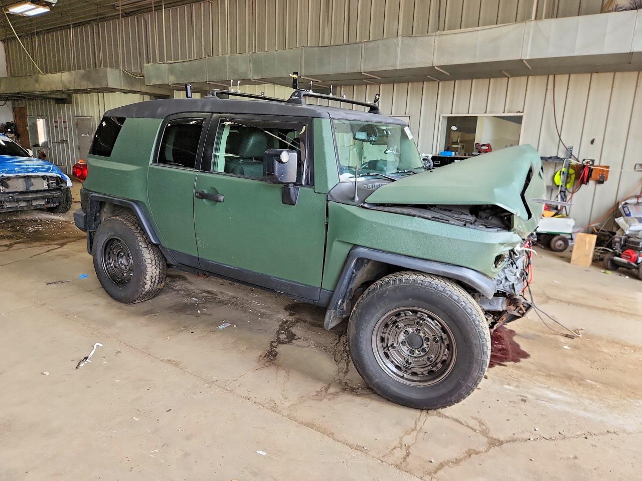 2012 Toyota Fj Cruiser Base Зеленый vin: JTEBU4BF5CK128602