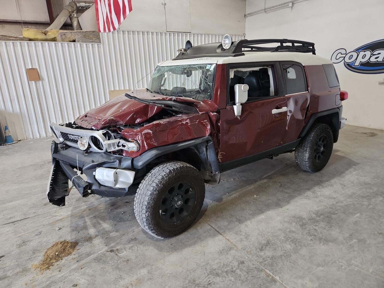 2011 Toyota Fj Cruiser Base Maroon vin: JTEBU4BF7BK105546 Damage: Left Front Fender, Severe Damage, Replacement Required