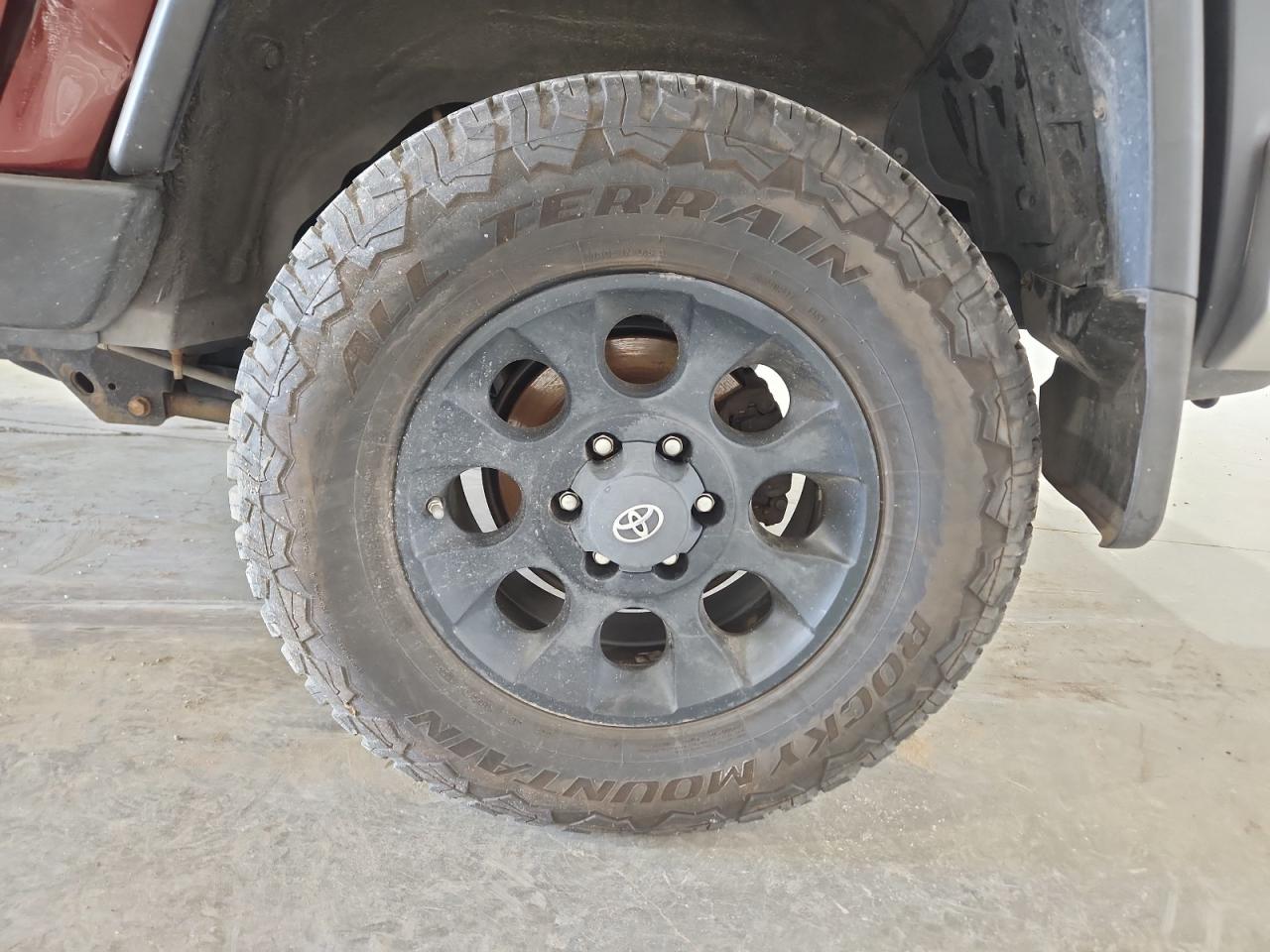 2011 Toyota Fj Cruiser Base Maroon vin: JTEBU4BF7BK105546 Damage: Left Rear Wheel, Chipped, 10 Or More