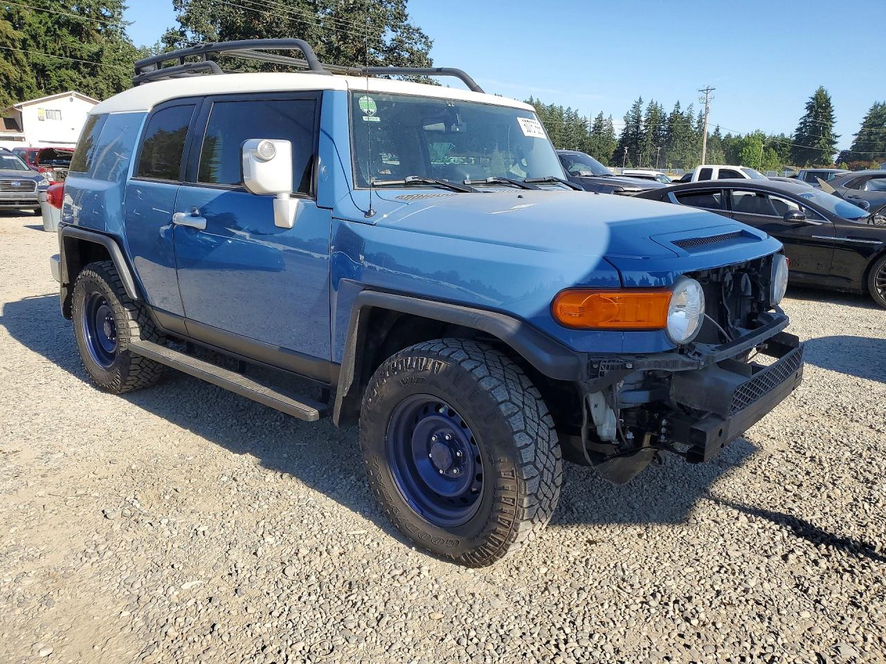 2011 Toyota Fj Cruiser Base Blue vin: JTEBU4BF8BK106429
