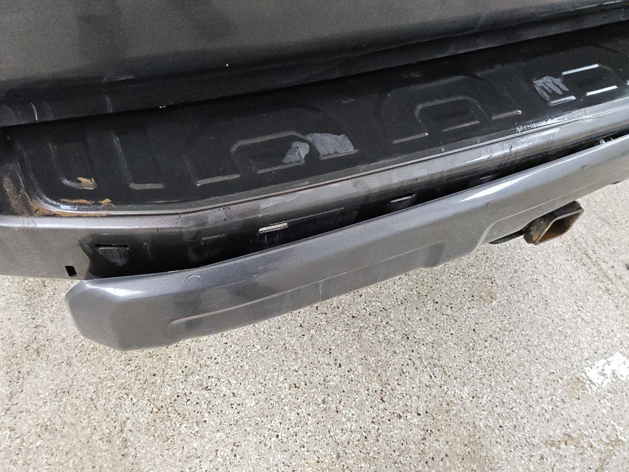 2015 Toyota 4runner Trail Premium Gray vin: JTEBU5JR8F5261715 Damage: Rear Bumper Molding, Broken, Replacement Required