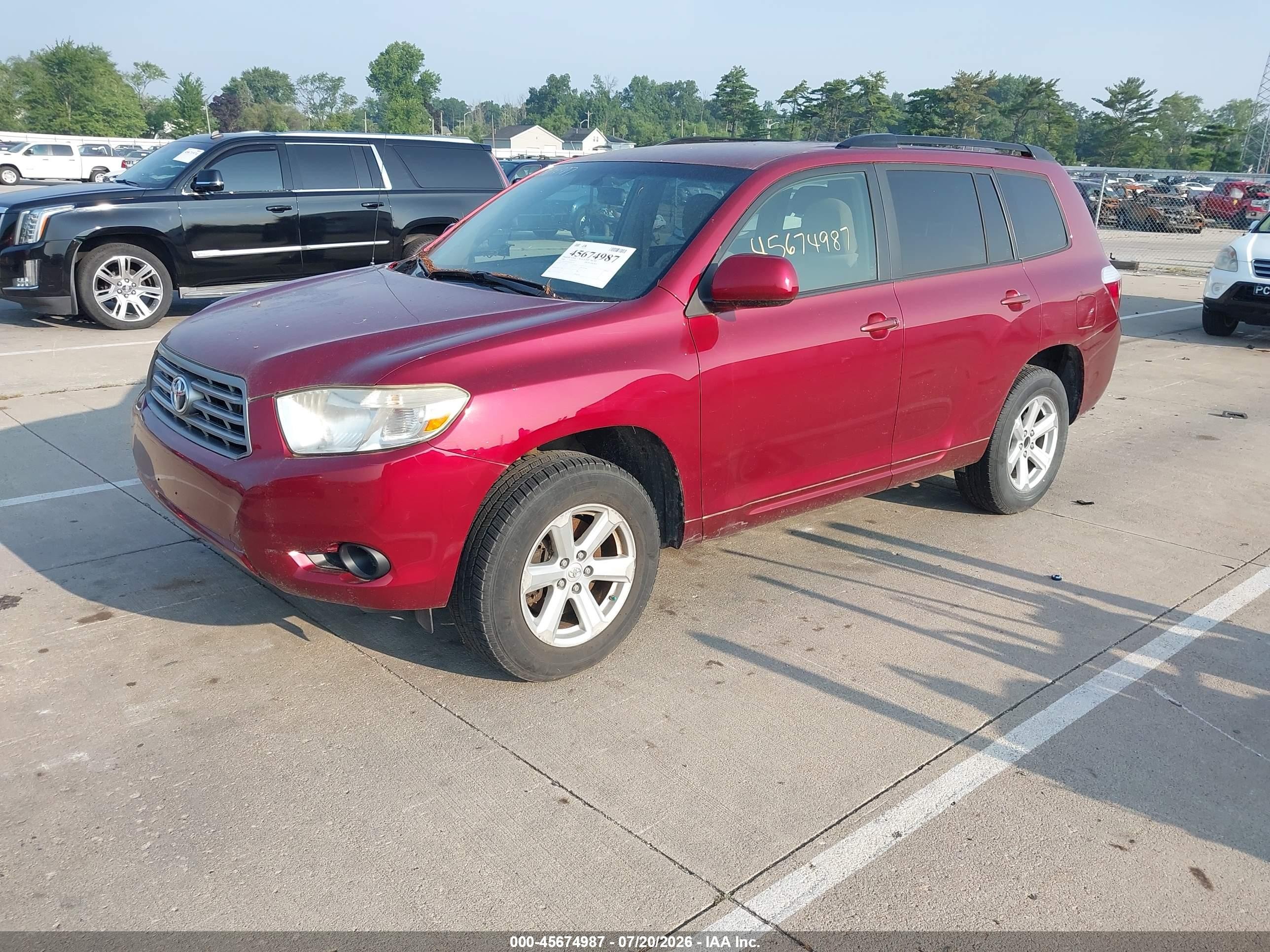 2009 Toyota Highlander   Red vin: JTEDA41A092004799