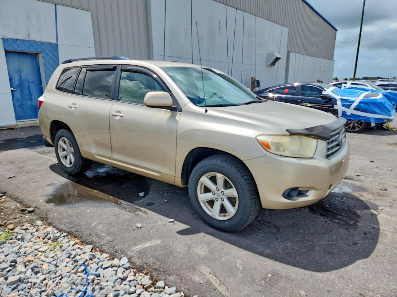 2009 Toyota Highlander Base Gold vin: JTEDA41A892006249