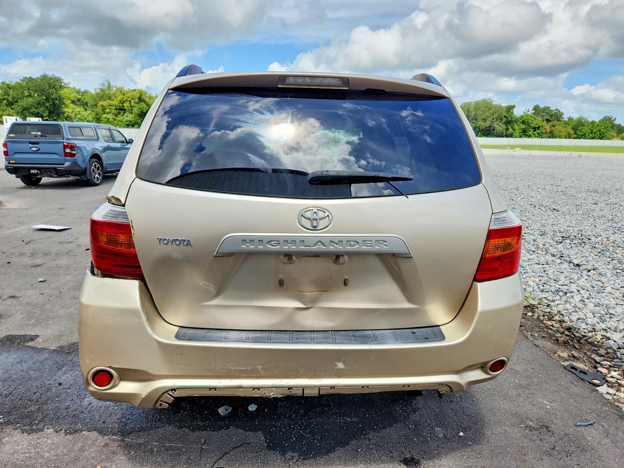 2009 Toyota Highlander Base Gold vin: JTEDA41A892006249