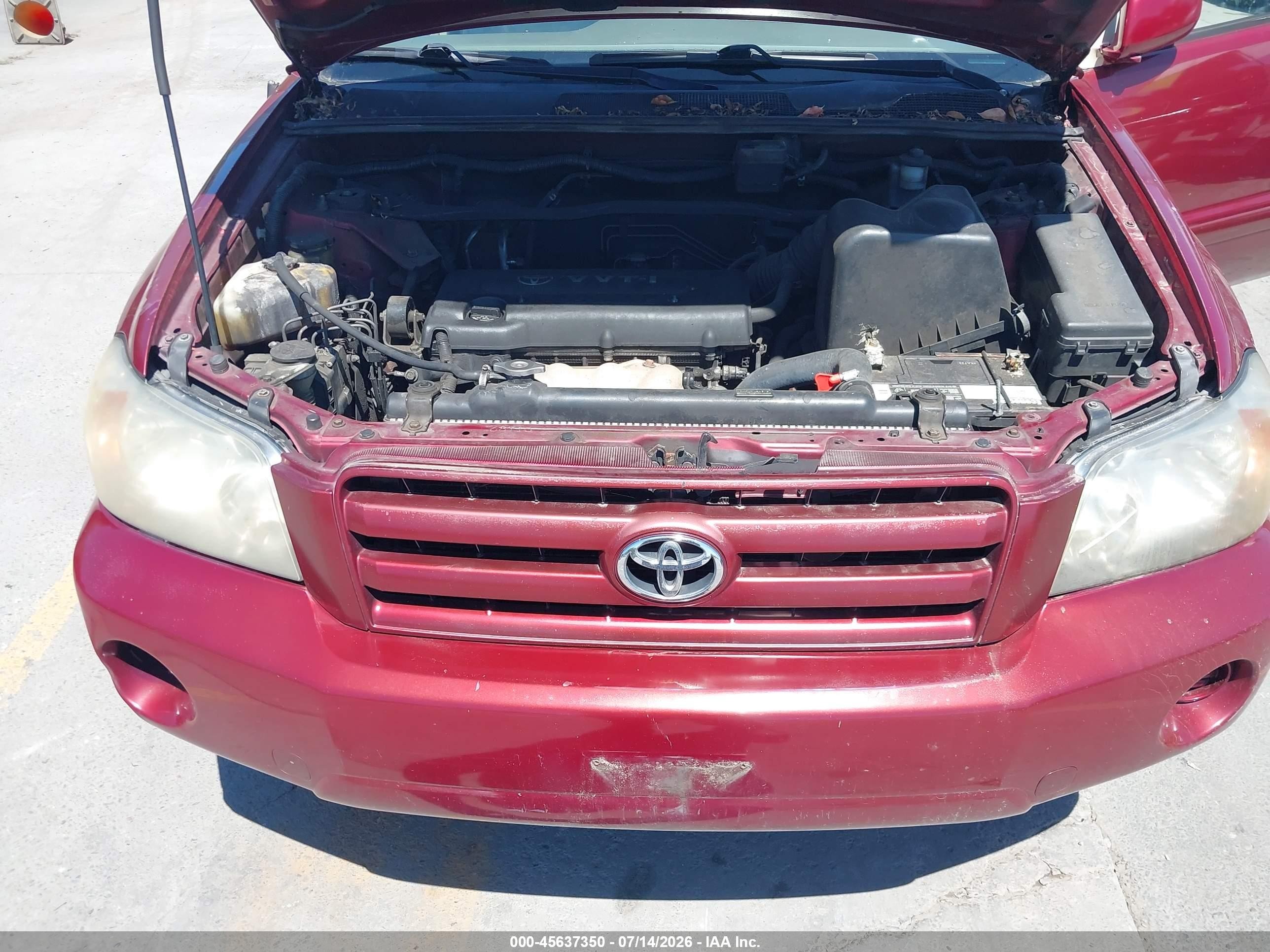 2006 Toyota Highlander   Red vin: JTEDD21AX60139324