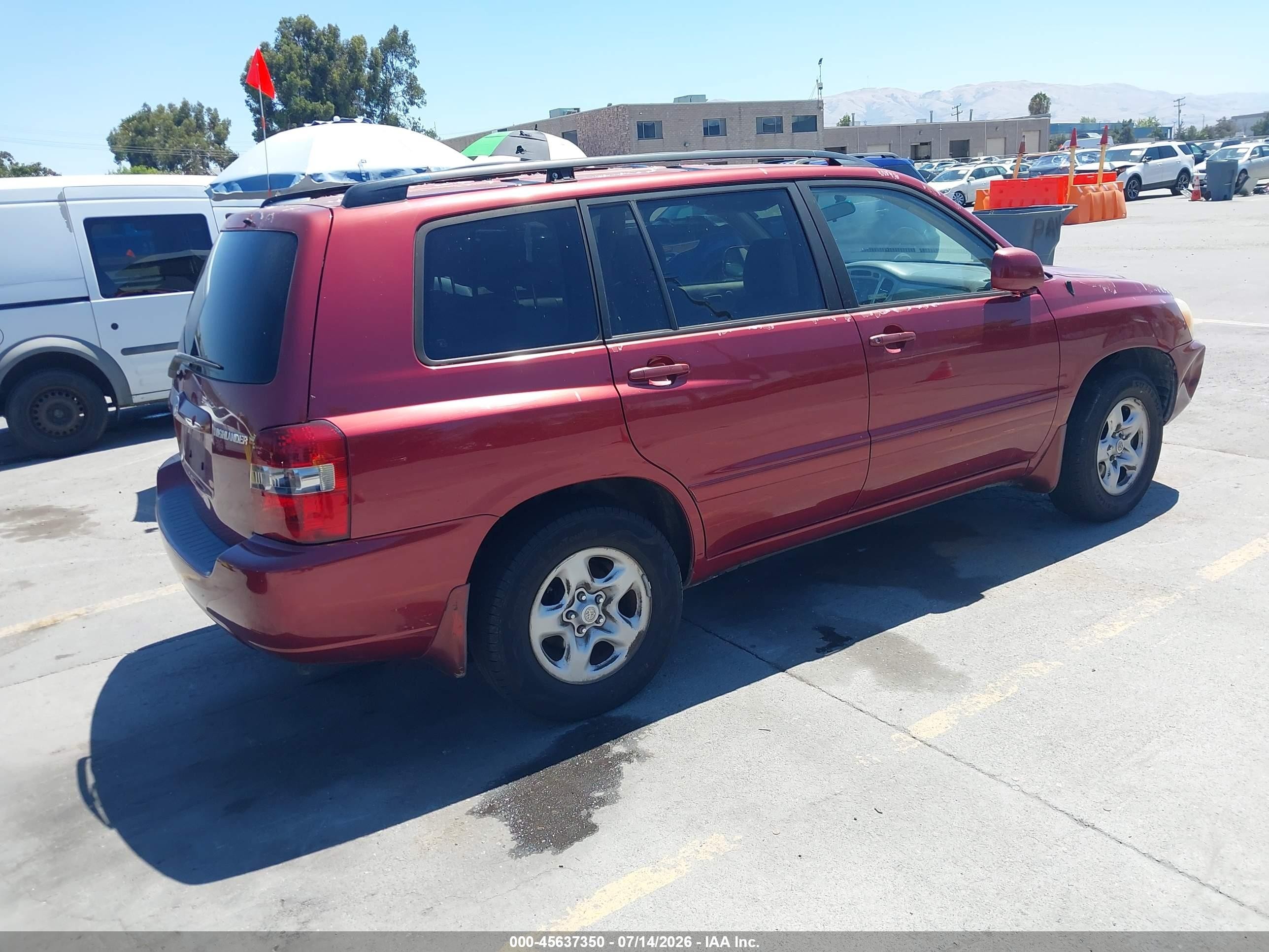 2006 Toyota Highlander   Red vin: JTEDD21AX60139324