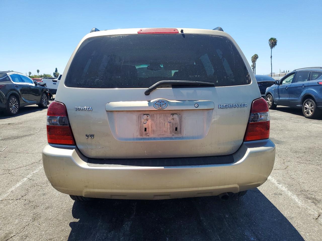 2004 Toyota Highlander Base Tan vin: JTEDP21A740016469