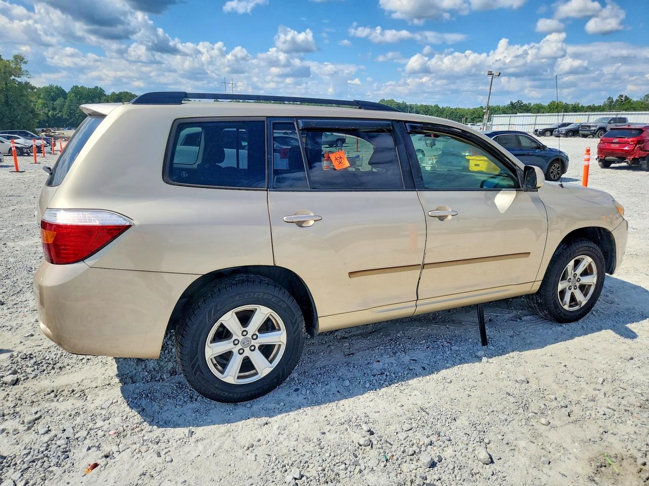 2009 Toyota Highlander Base Gold vin: JTEDS41A892082003