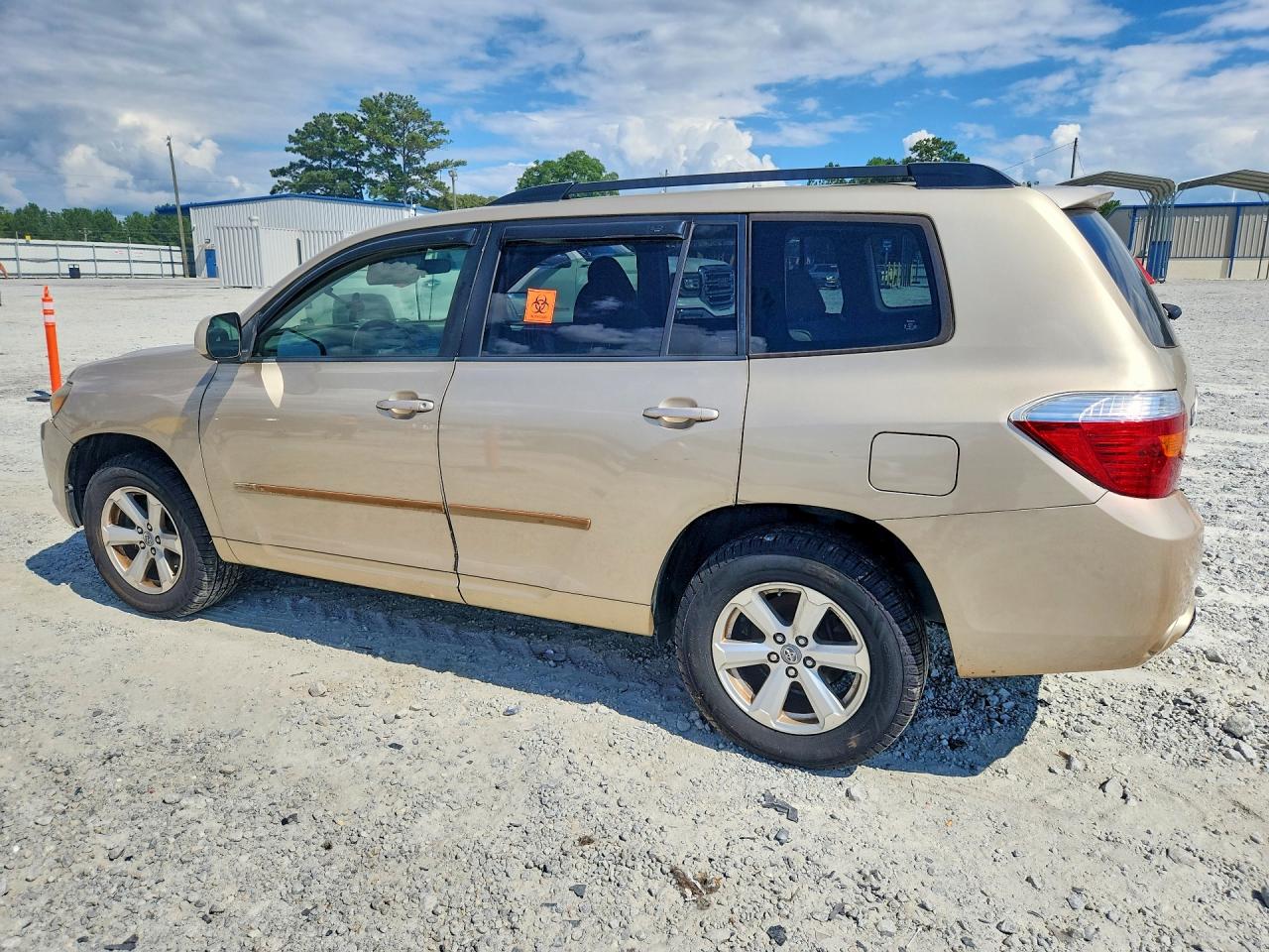 2009 Toyota Highlander Base Gold vin: JTEDS41A892082003